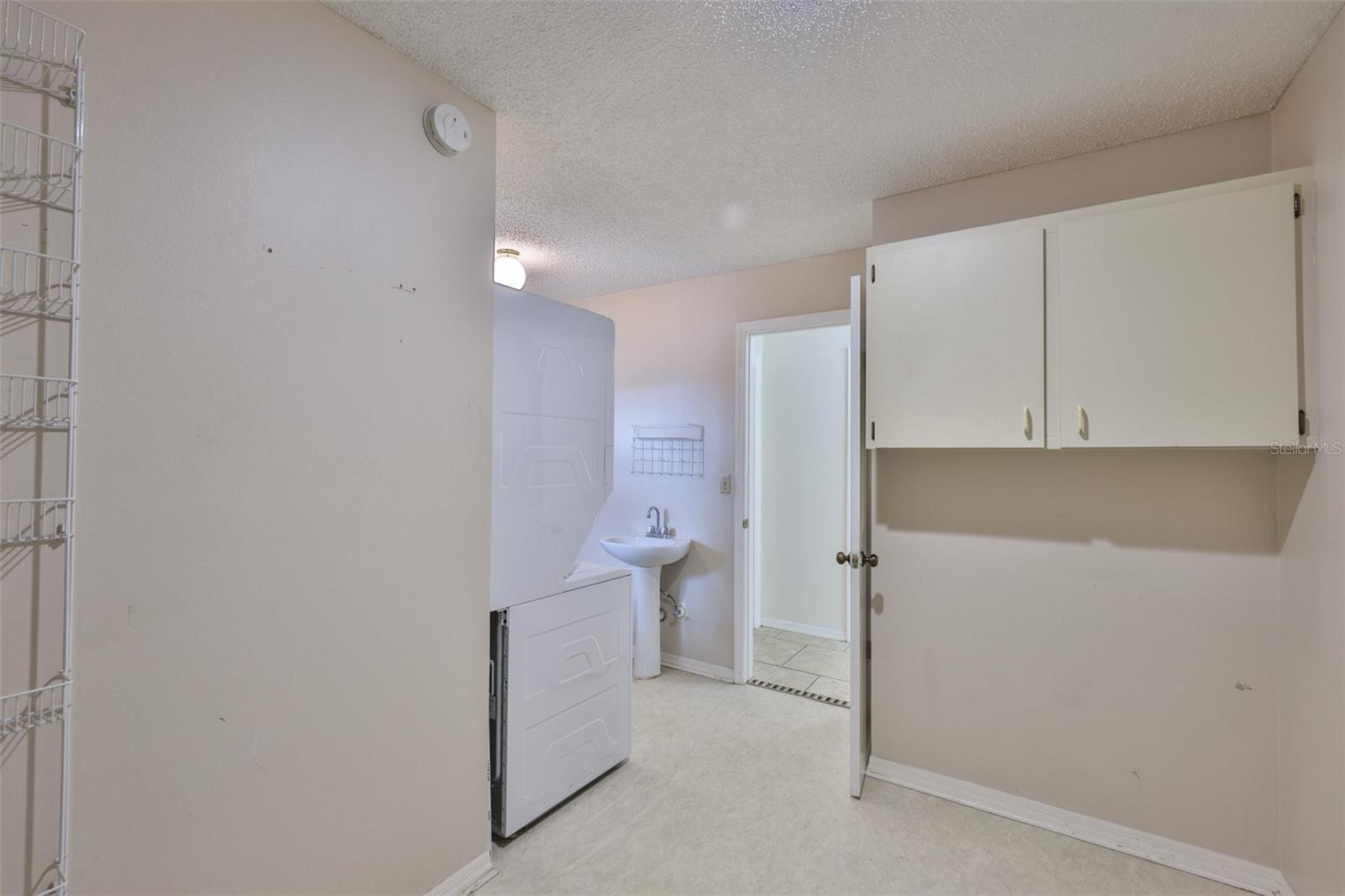 Golf cart garage, left - laundry room. Center to hall way.