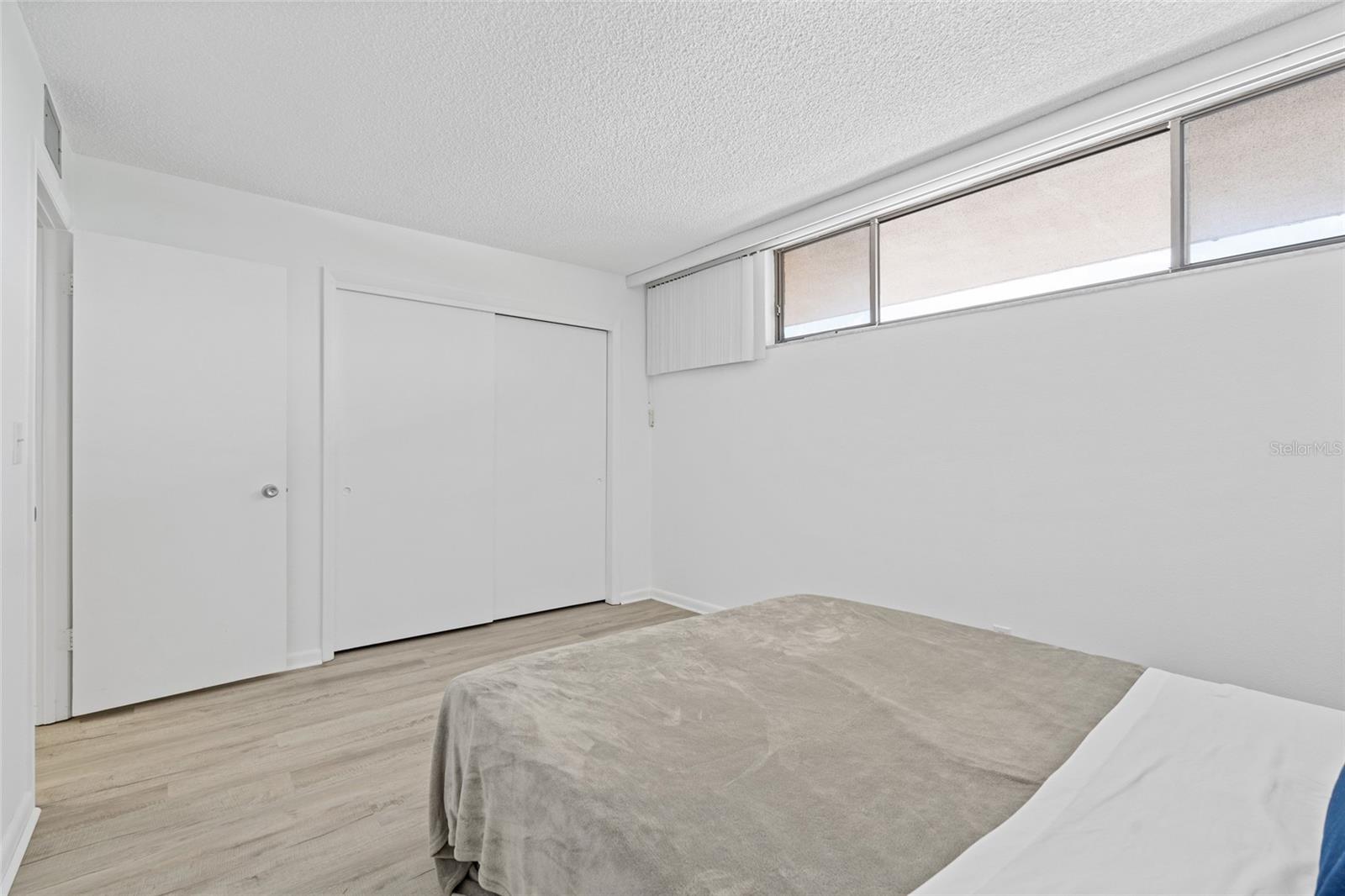 Second bedroom has a long closet for a lot of storage.