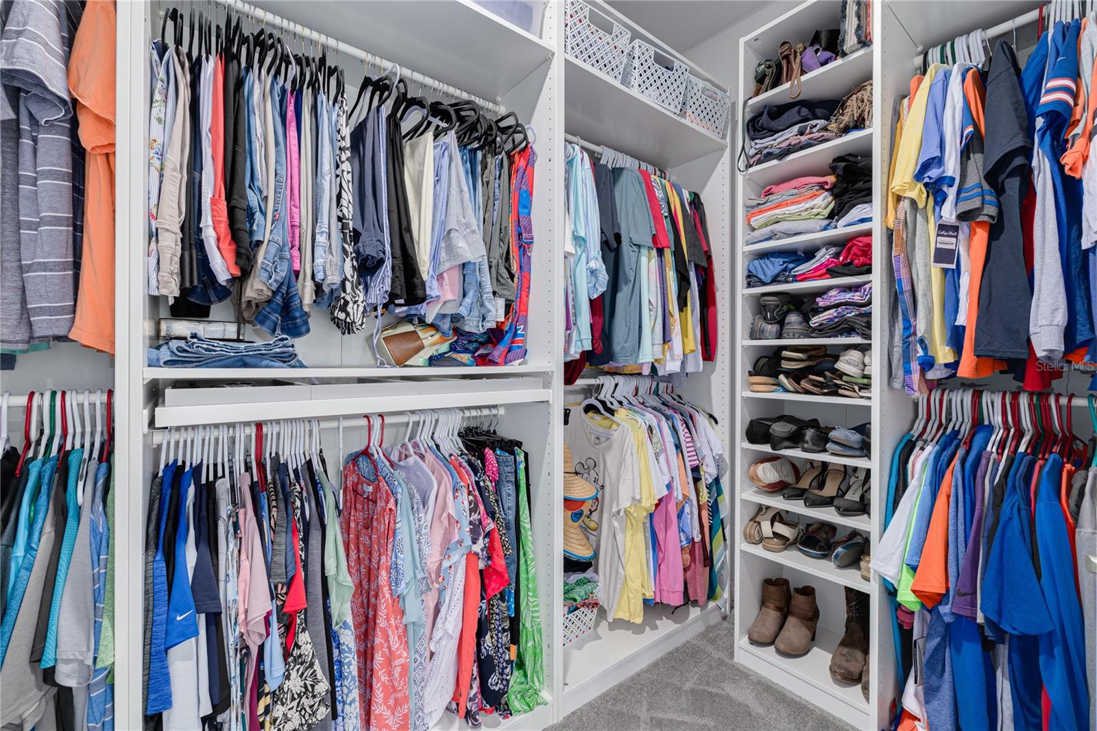 Large Master Bedroom closet with custom built-ins
