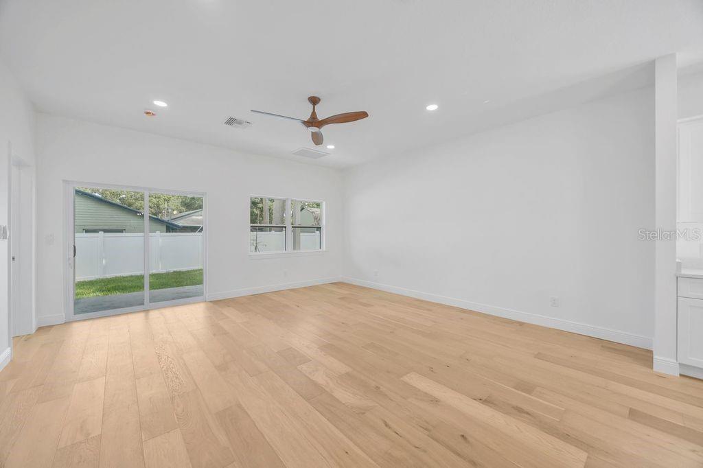 Living room with sliding glass doors to the porch