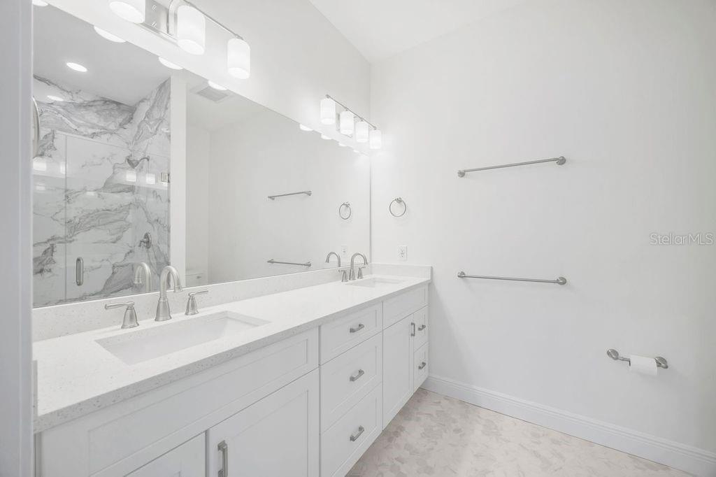 Master bathroom with dual sinks