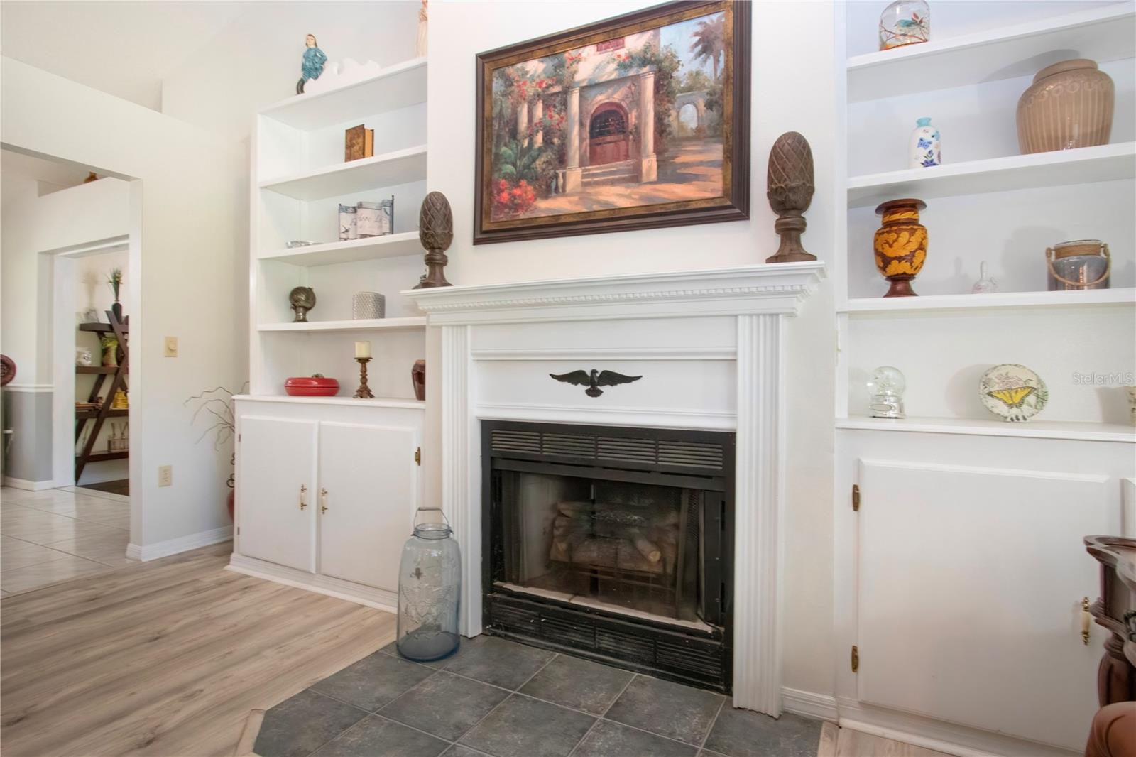 Formal Living room With Fire Place and Built in Cabinetry