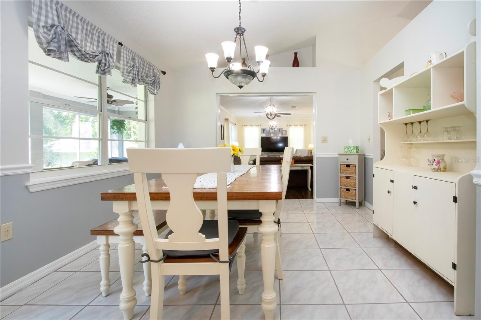 Dining Room with Large Window and Tons of Natural Light
