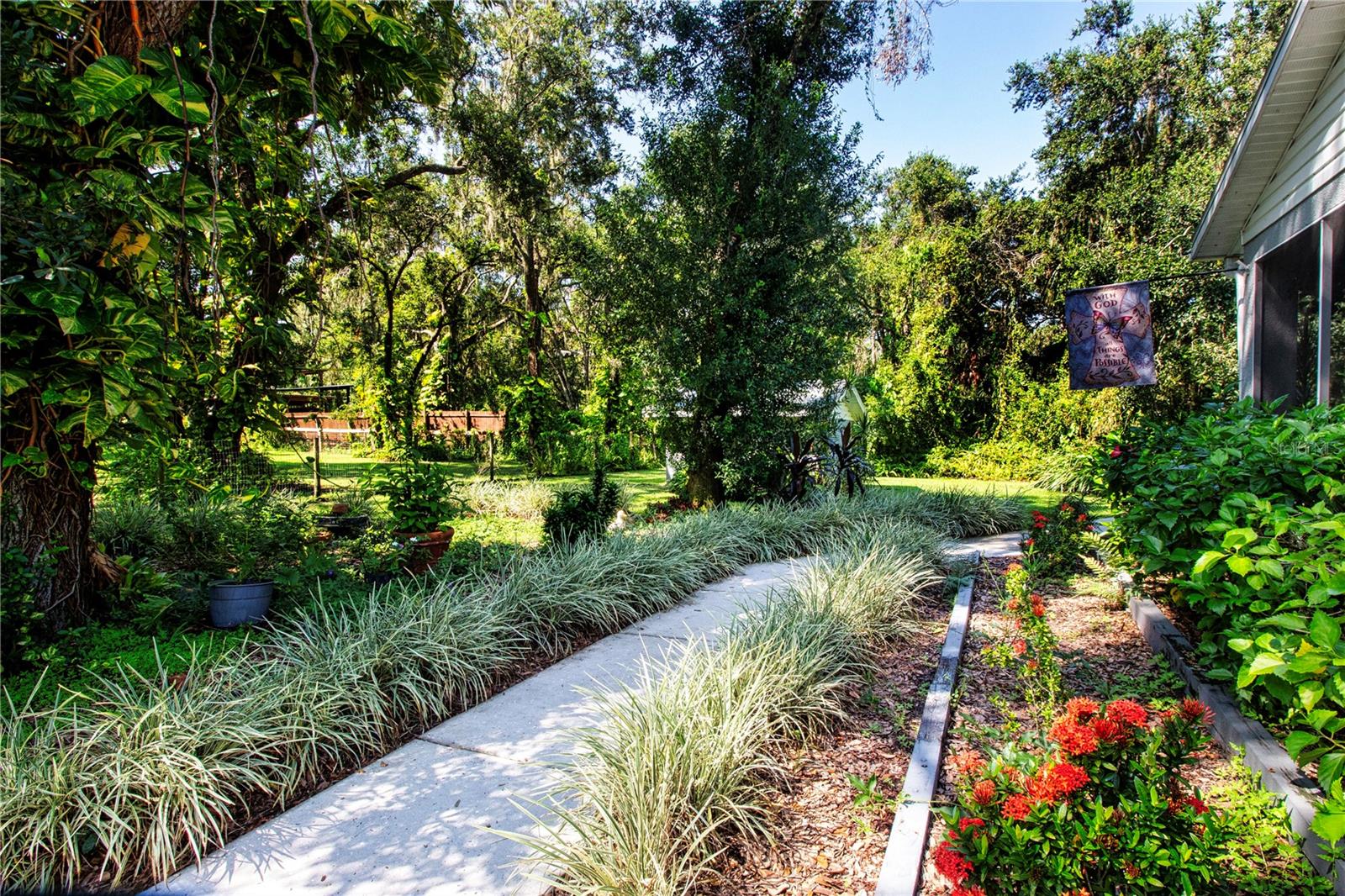 Sidewalk From The Back yard To The Enclosed lanai