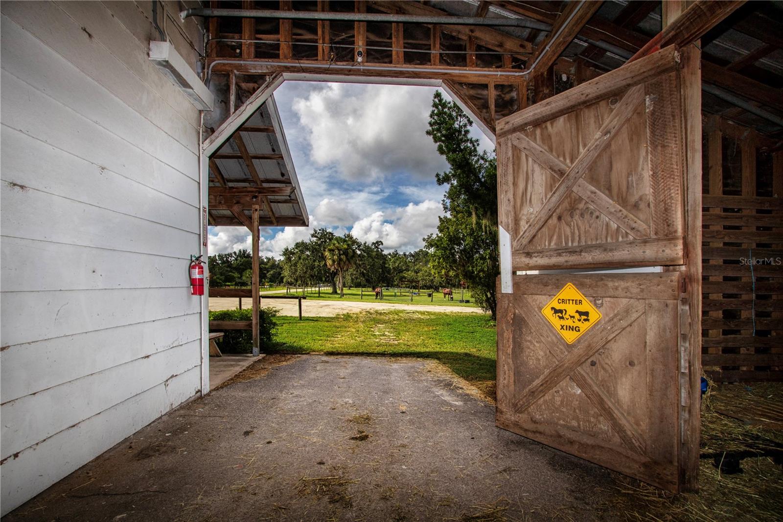 Exterior Barn door leading to the front of the stables