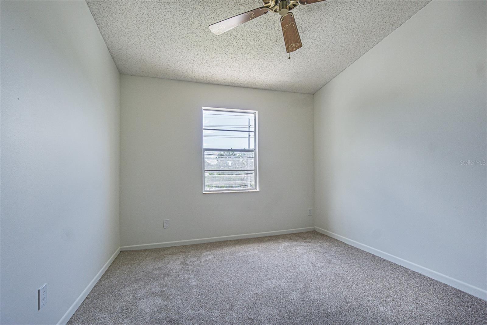 Third Floor Secondary Bedroom with walk-in closet.
