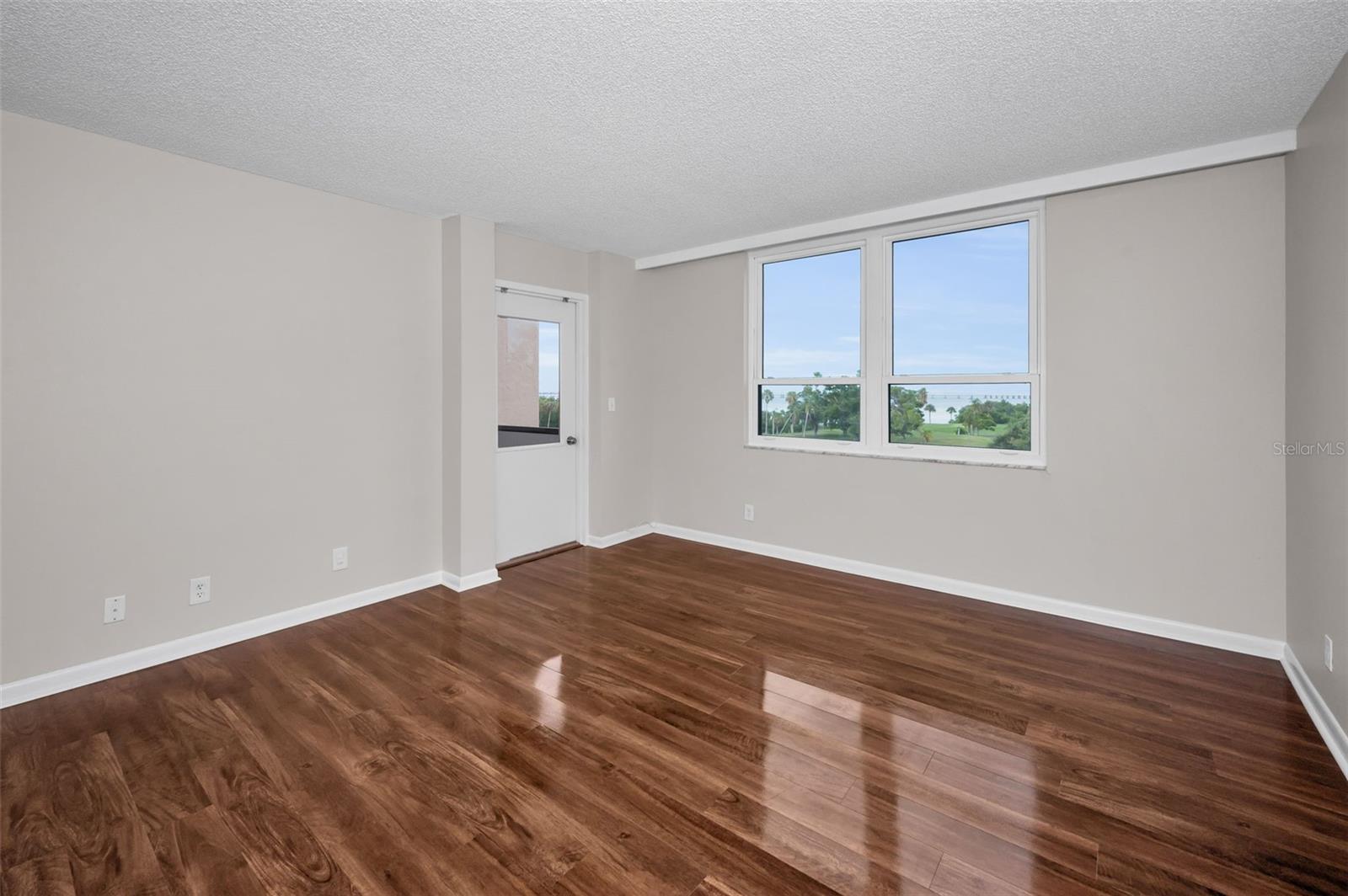Living area with an exit door to the Lanai