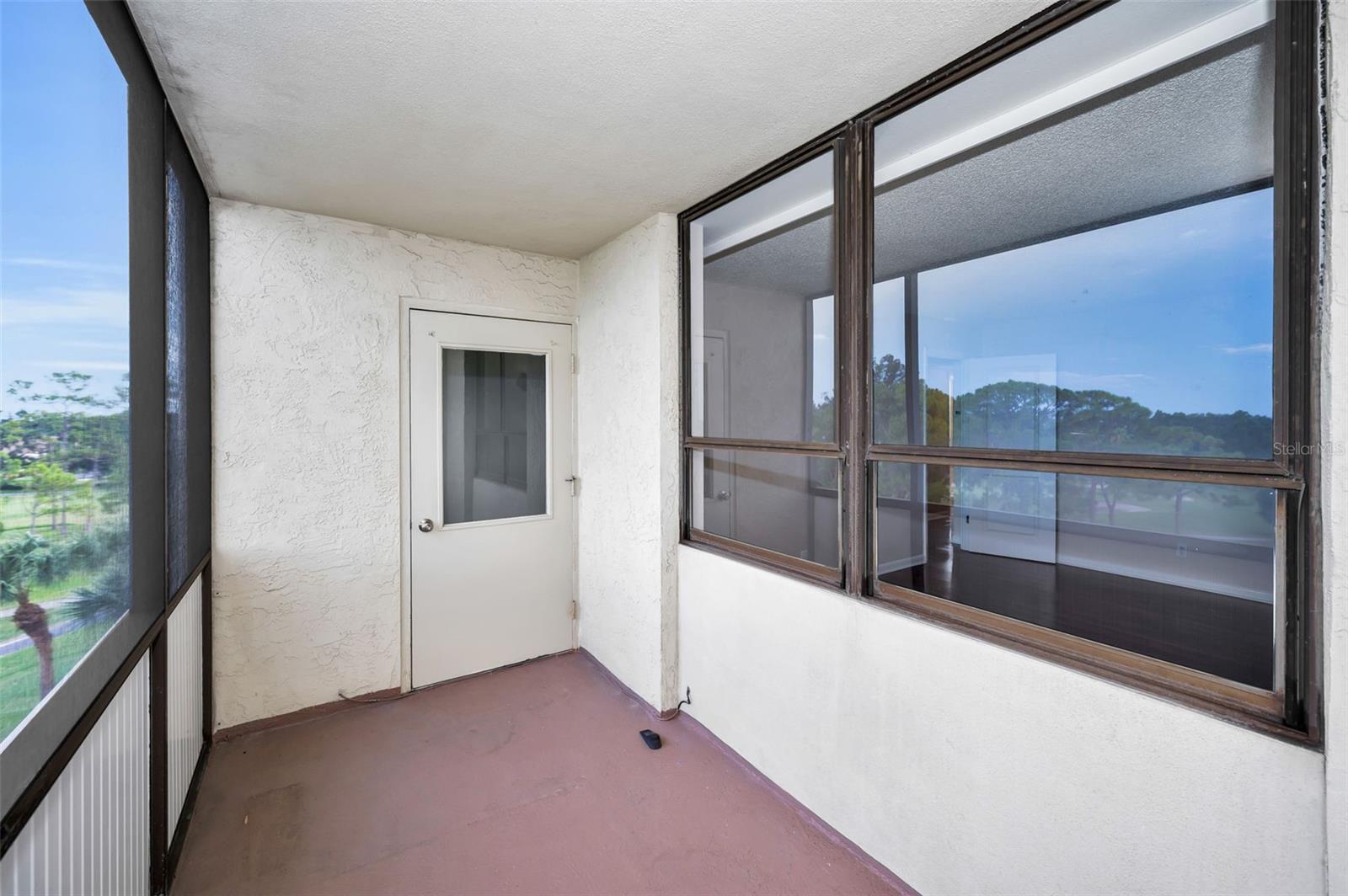 Enjoy quiet moments on your covered and screened Lanai