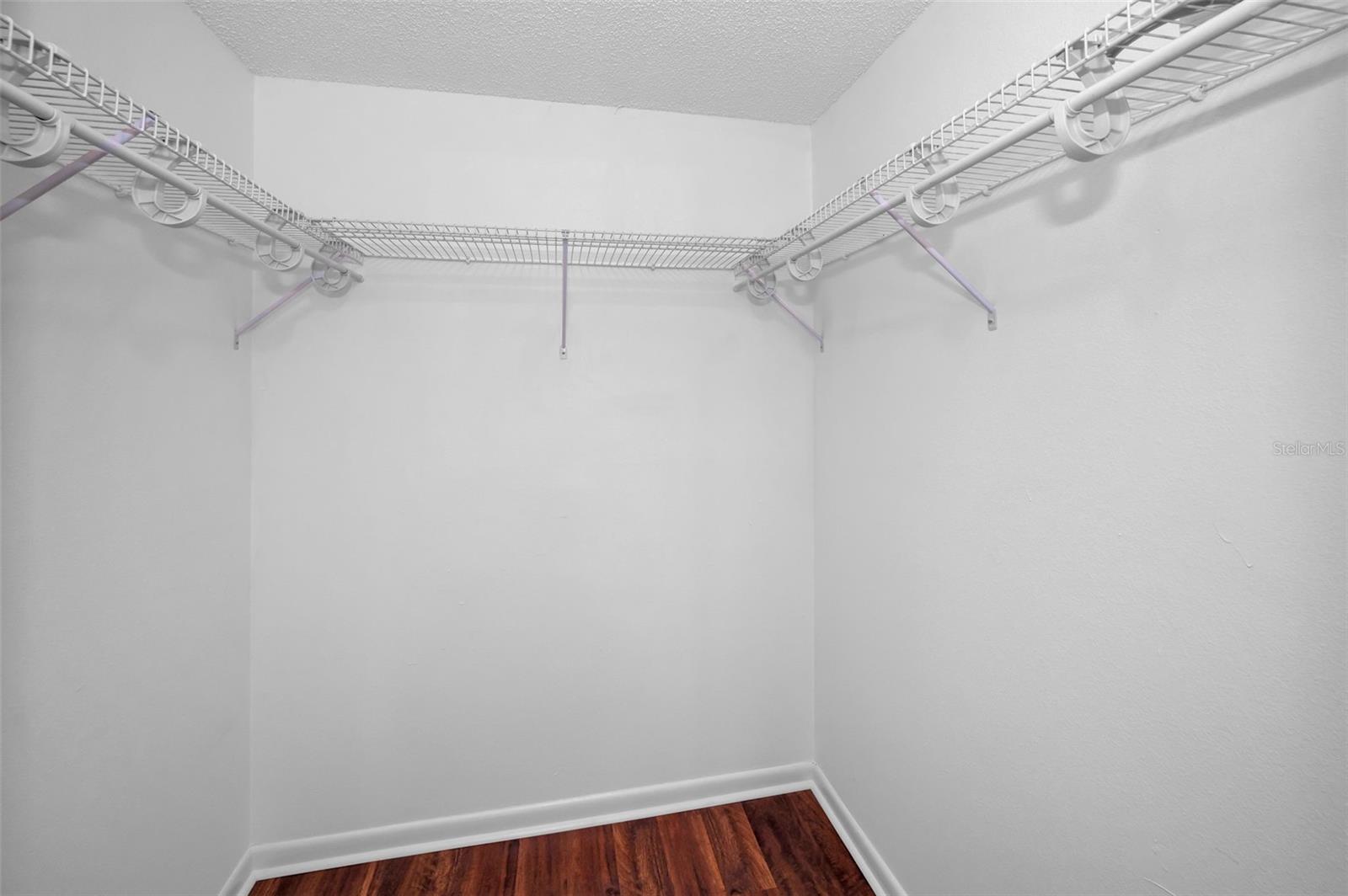 Large walk-in closet in the Primary Bedroom