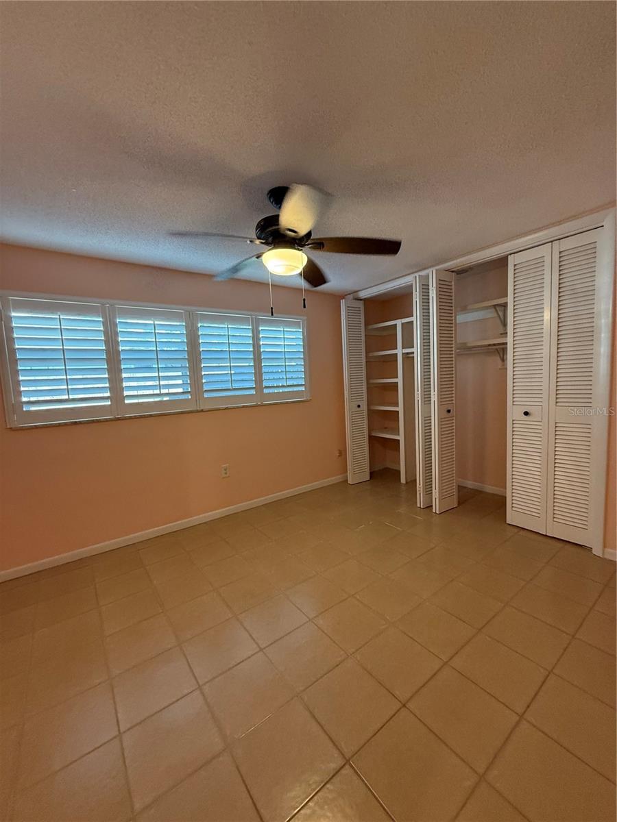 Bedroom 3 with built in closet shelving