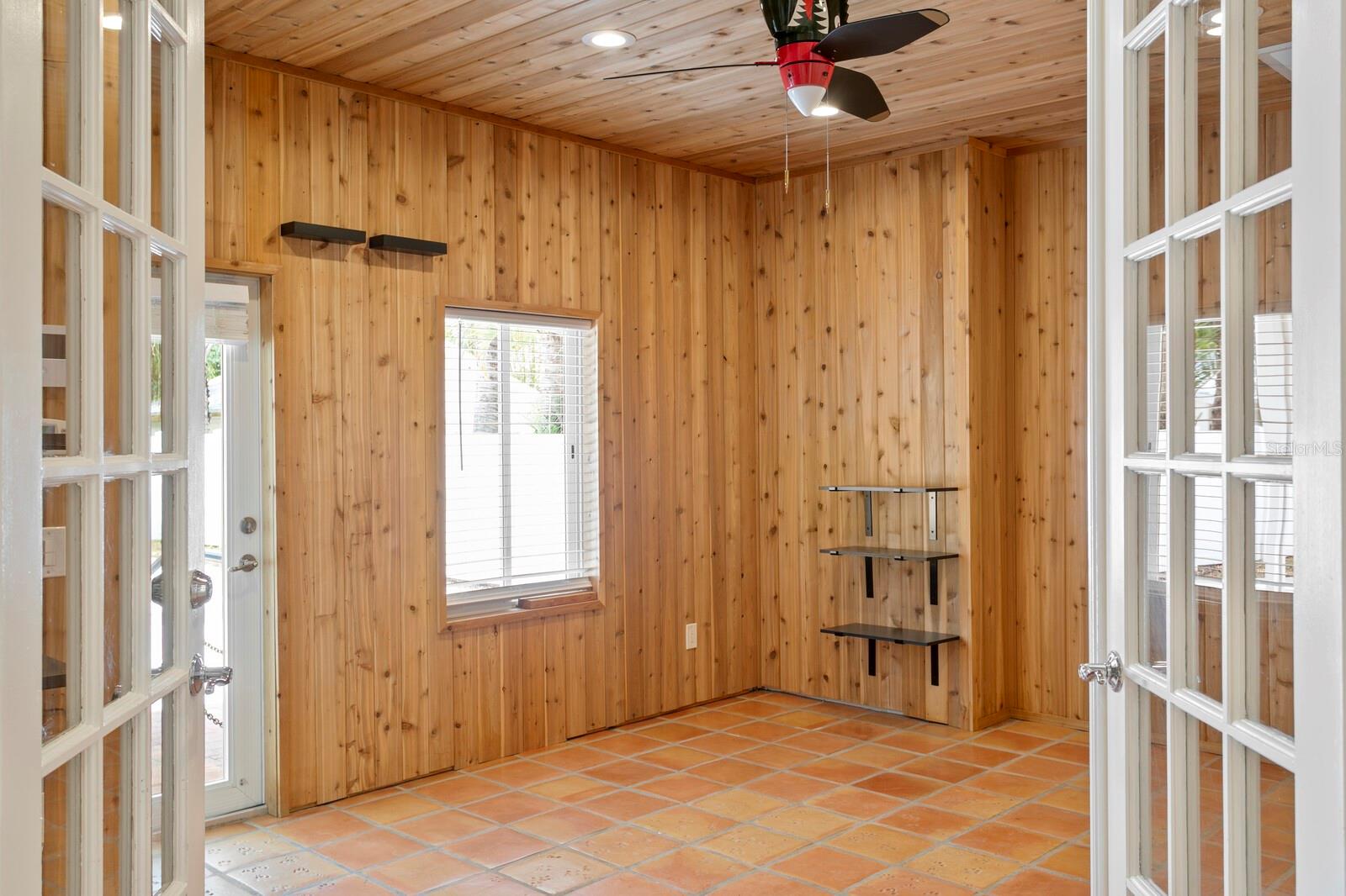 A unique cedar-lined den has been added to the back of the home