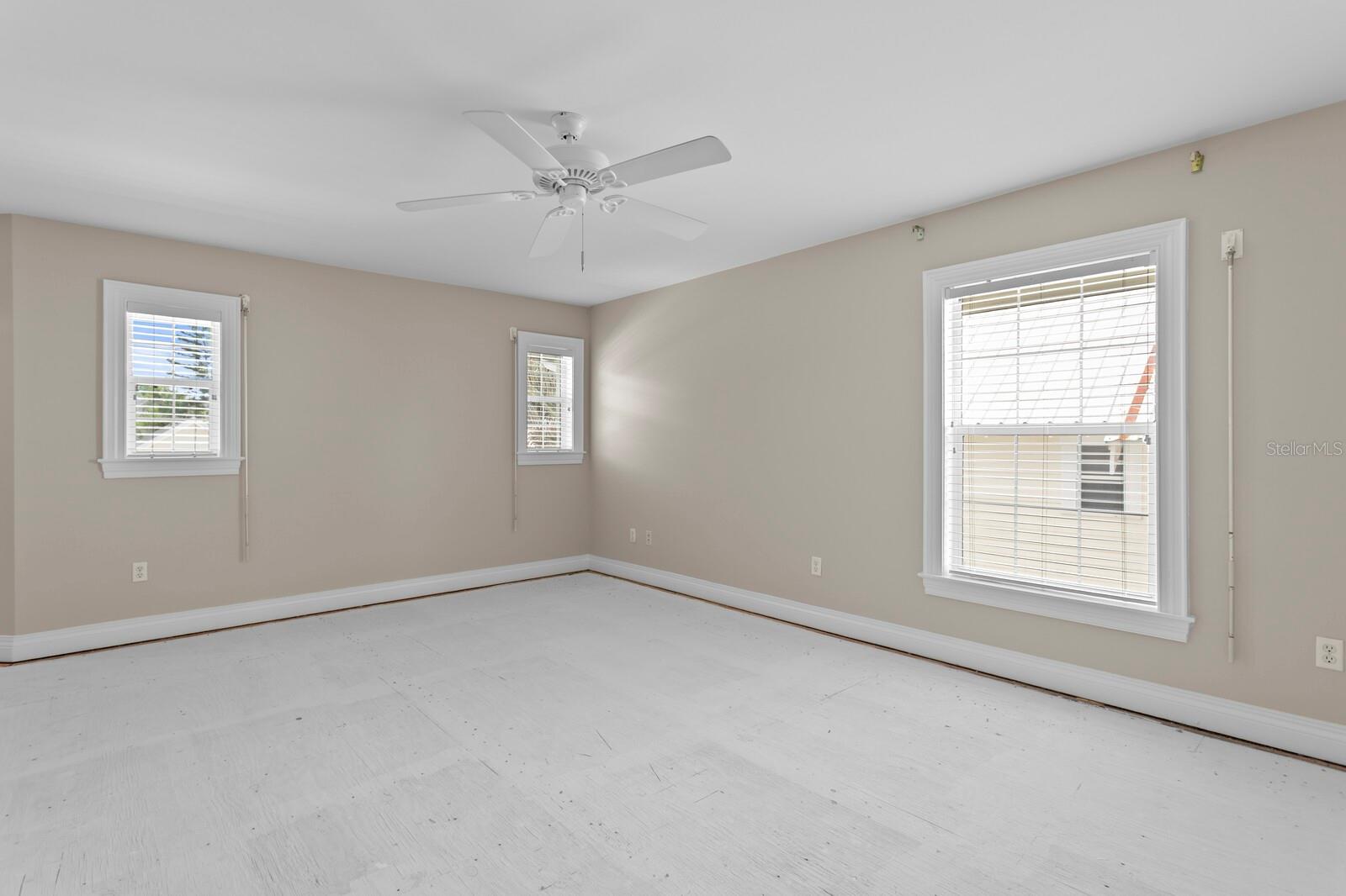 Primary suite with multiple windows