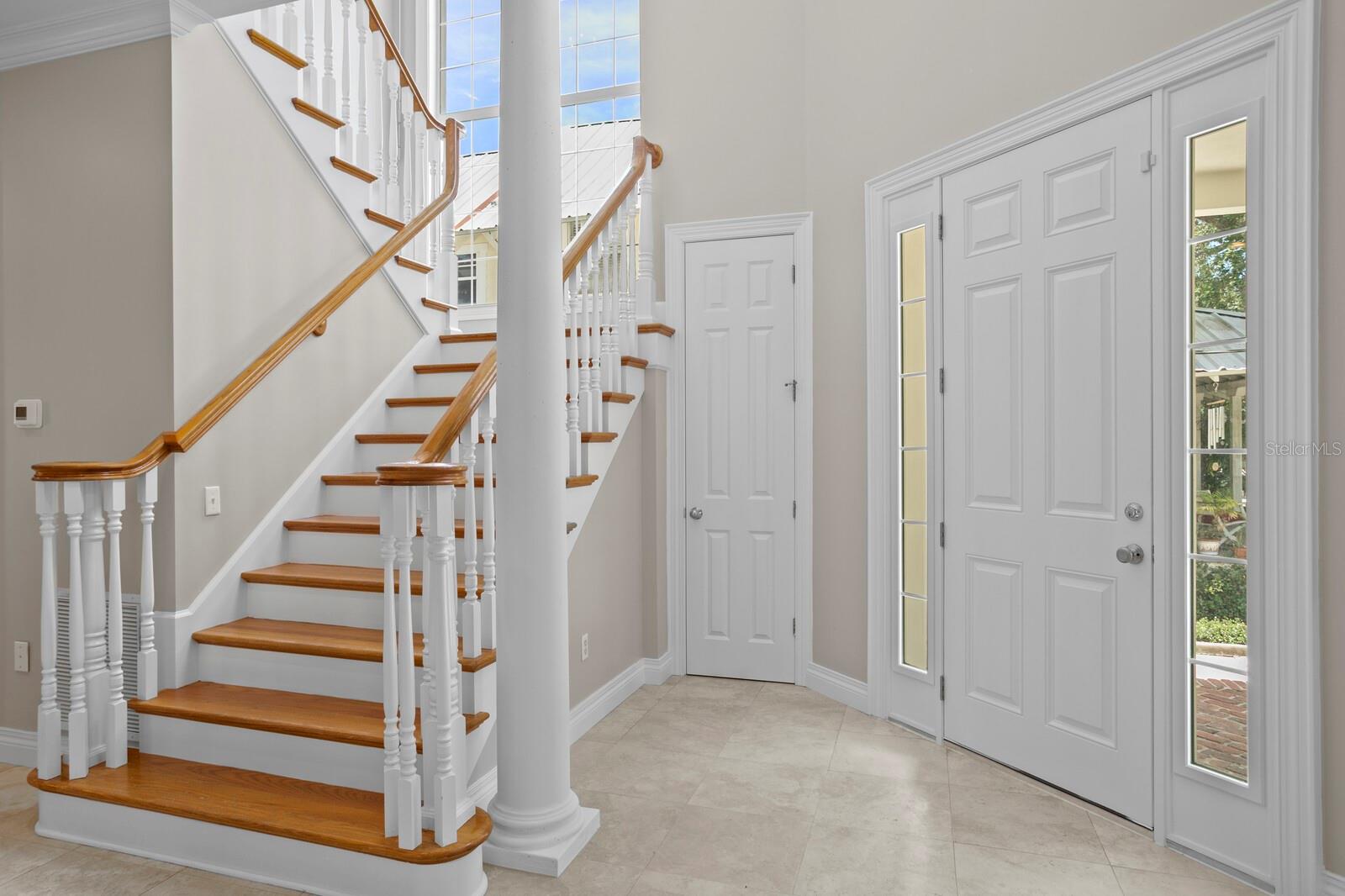 Foyer entrance with 19ft ceilings