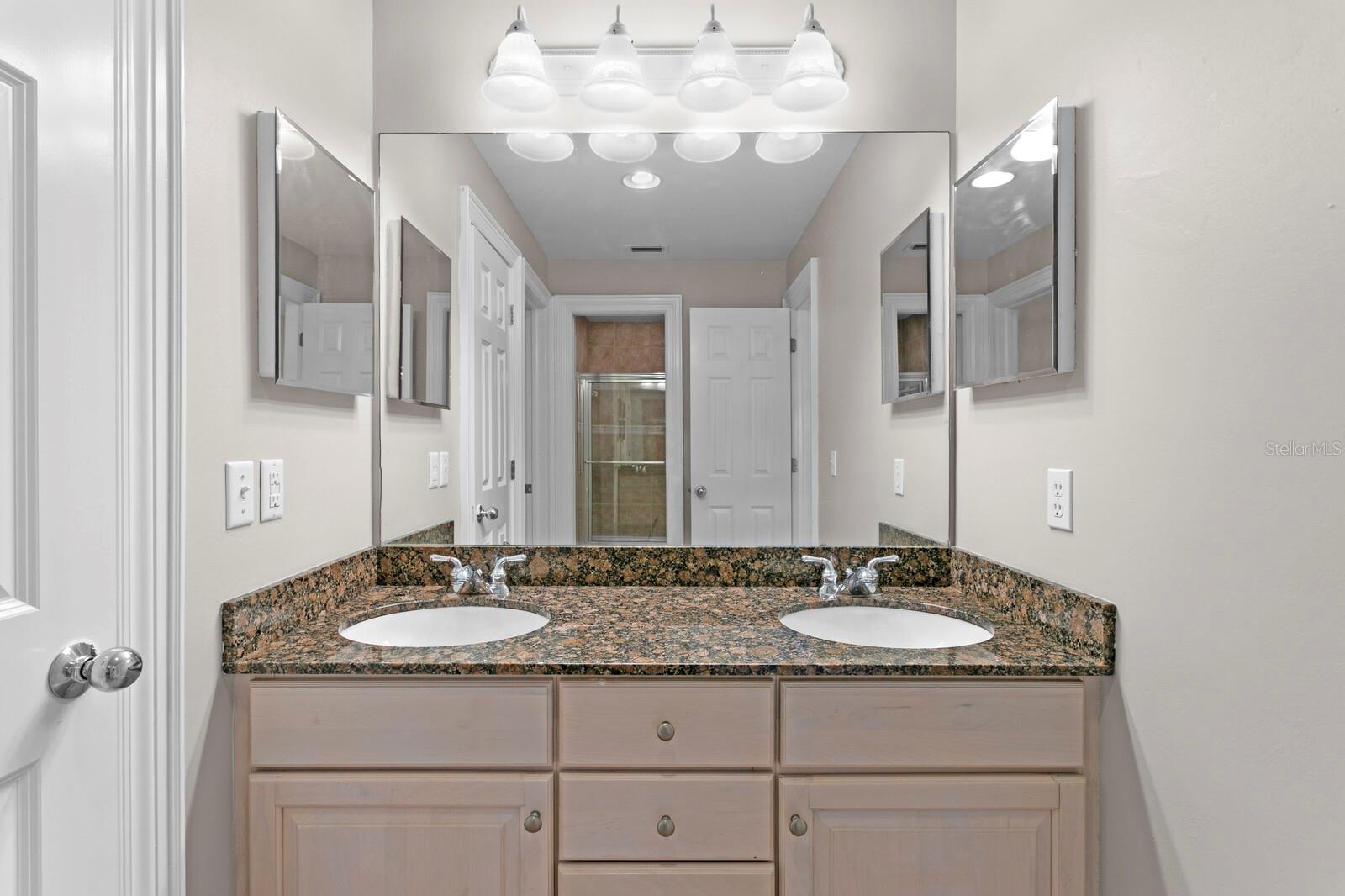 Jack-n-Jill bath between 2nd and 3rd bedrooms