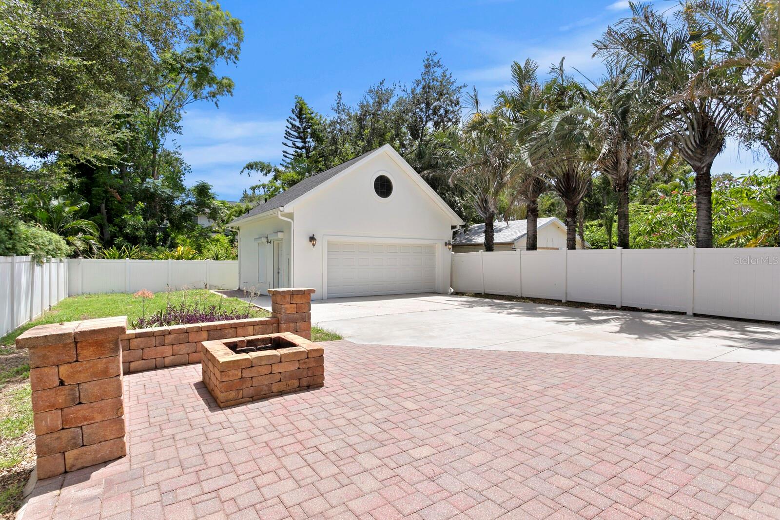 Views of the backyard from the outdoor kitchen