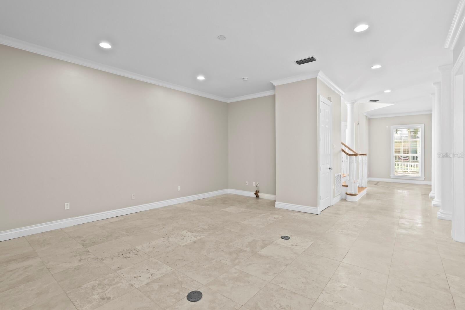 Freshly painted interior and travertine floors throughout 1st floor living areas