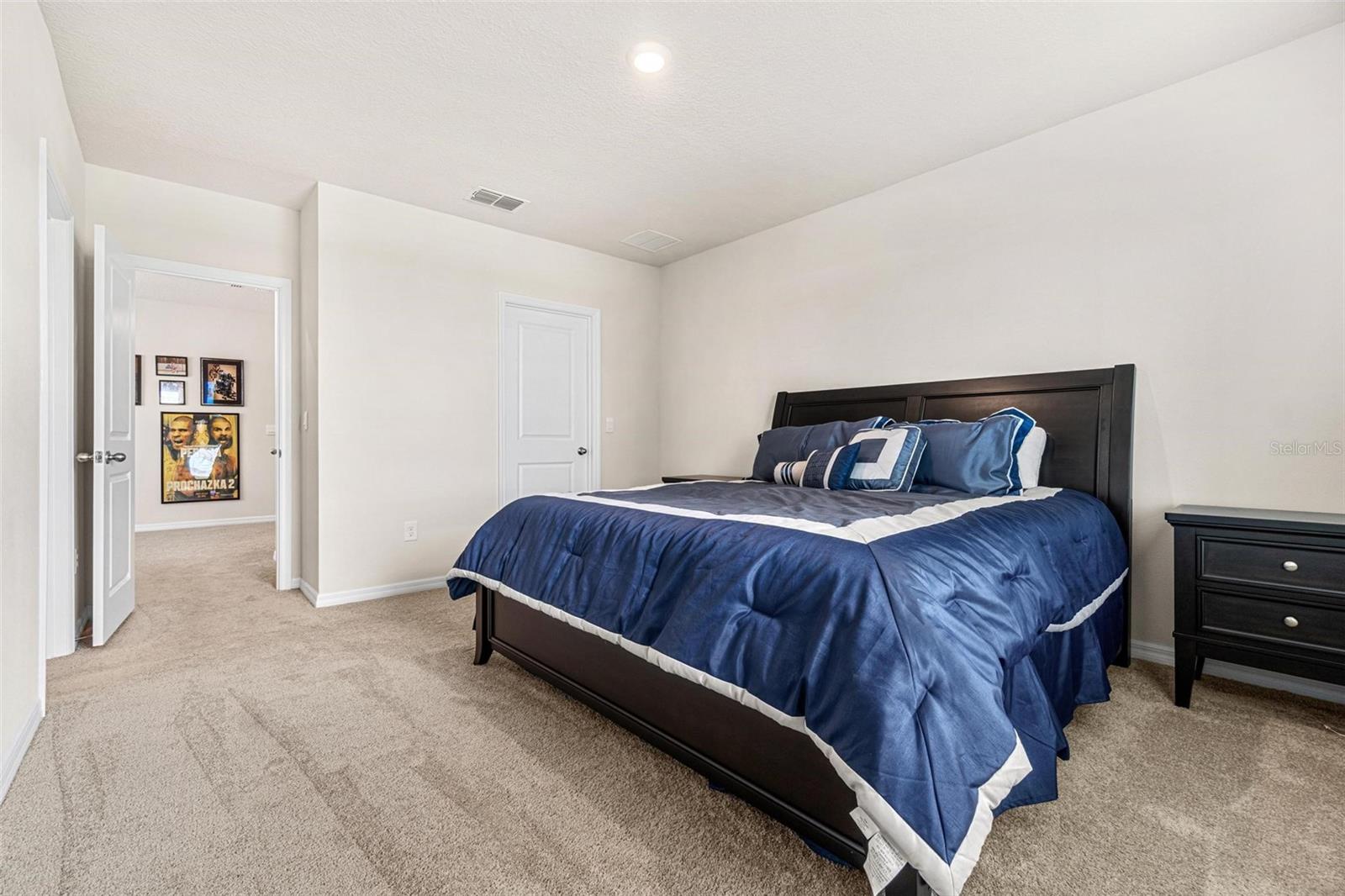 Primary Bedroom features 2 walk in closets