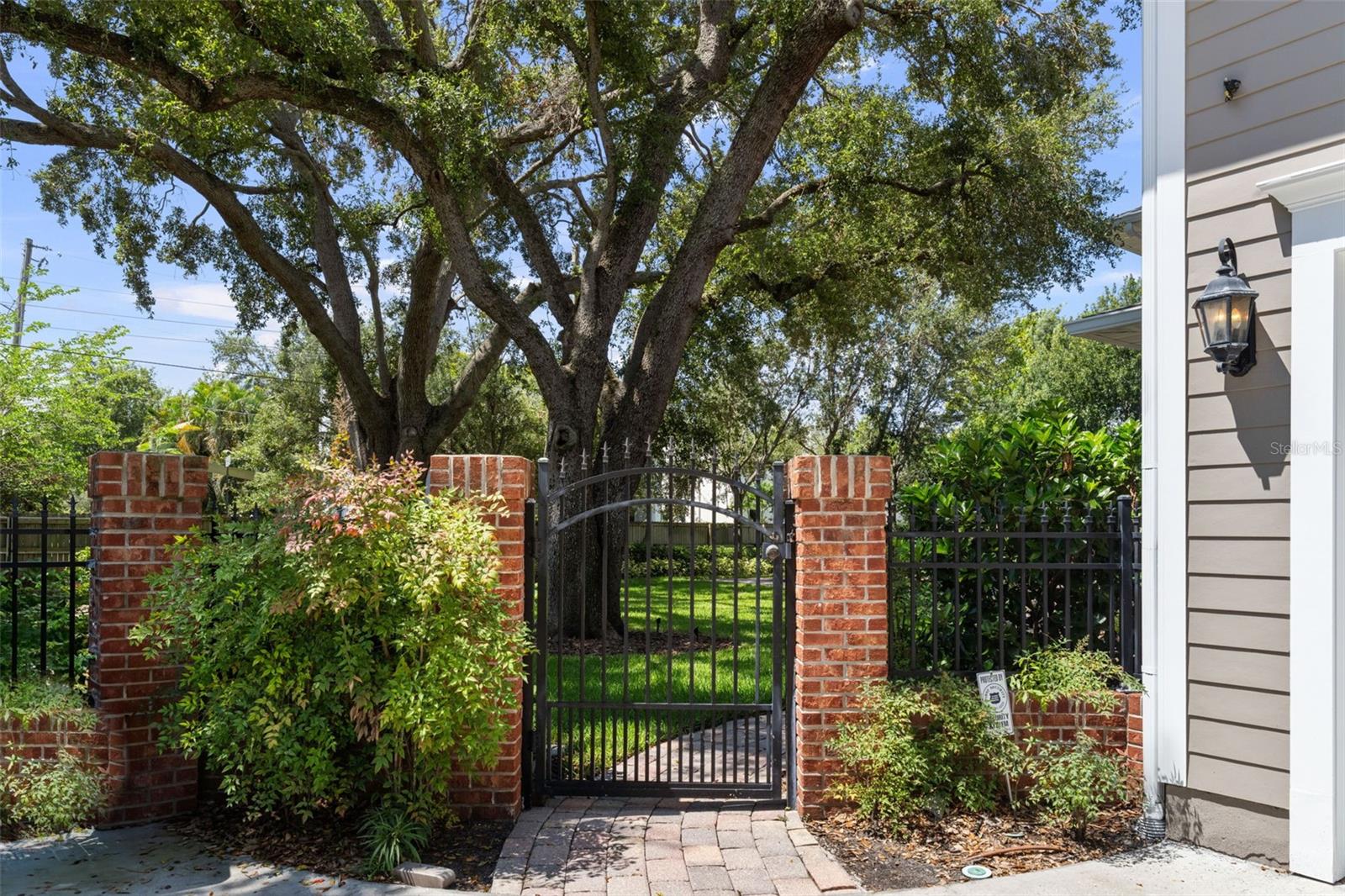 Gate leading to yard from driveway
