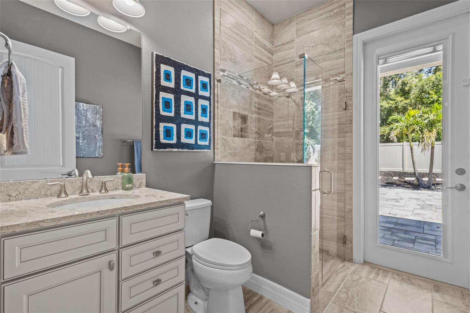 Full bath off Kitchen and accessible Poolside