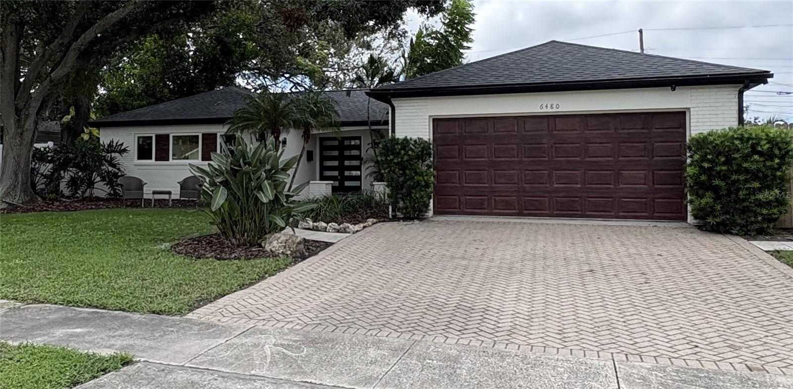 Brick Herring Bone Pavers and custom painted garage door