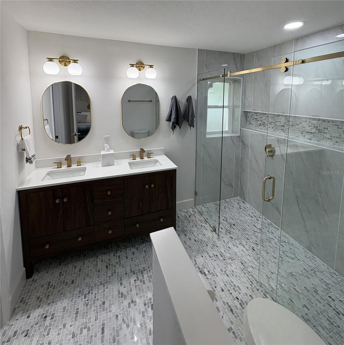Welcome to your own personal marble featured ensuite!