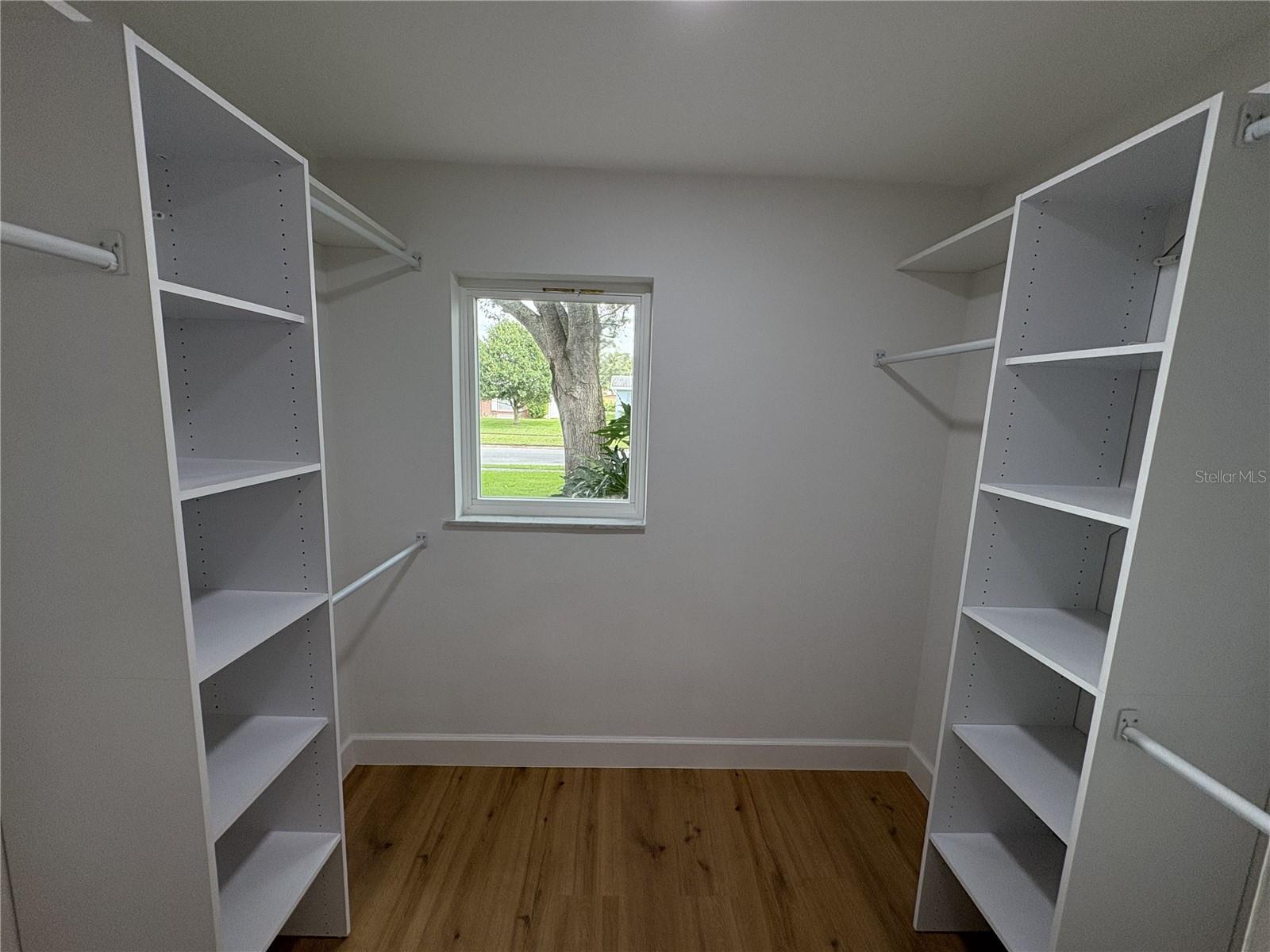 Not only a walk in closet but a window too!