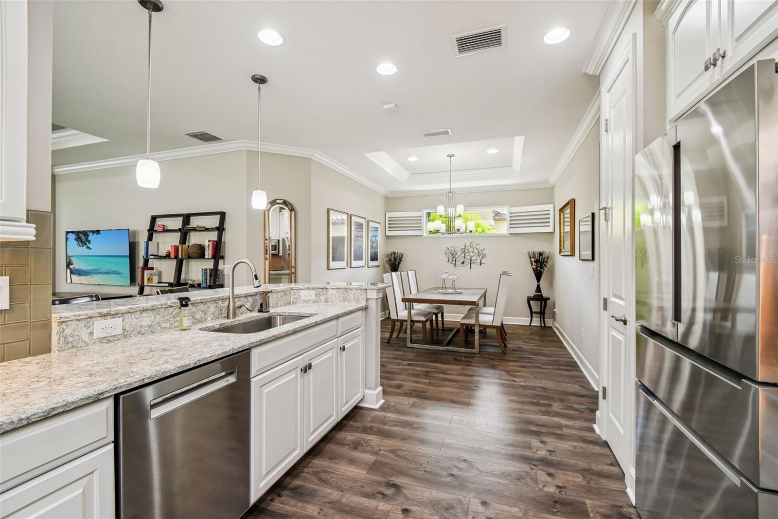 Luxury laminate flooring throughout