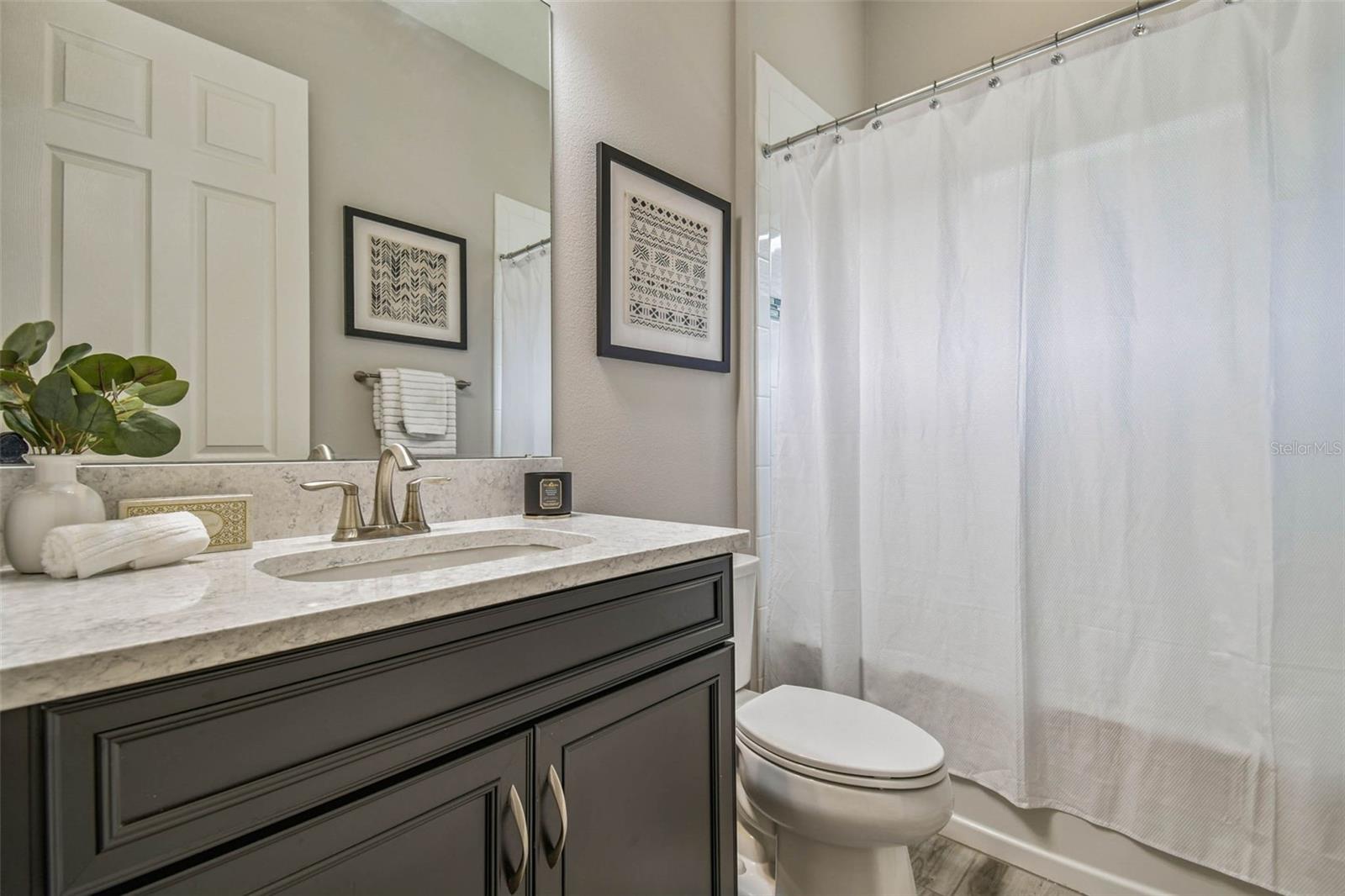Main floor FULL bathroom for guests close to guest room