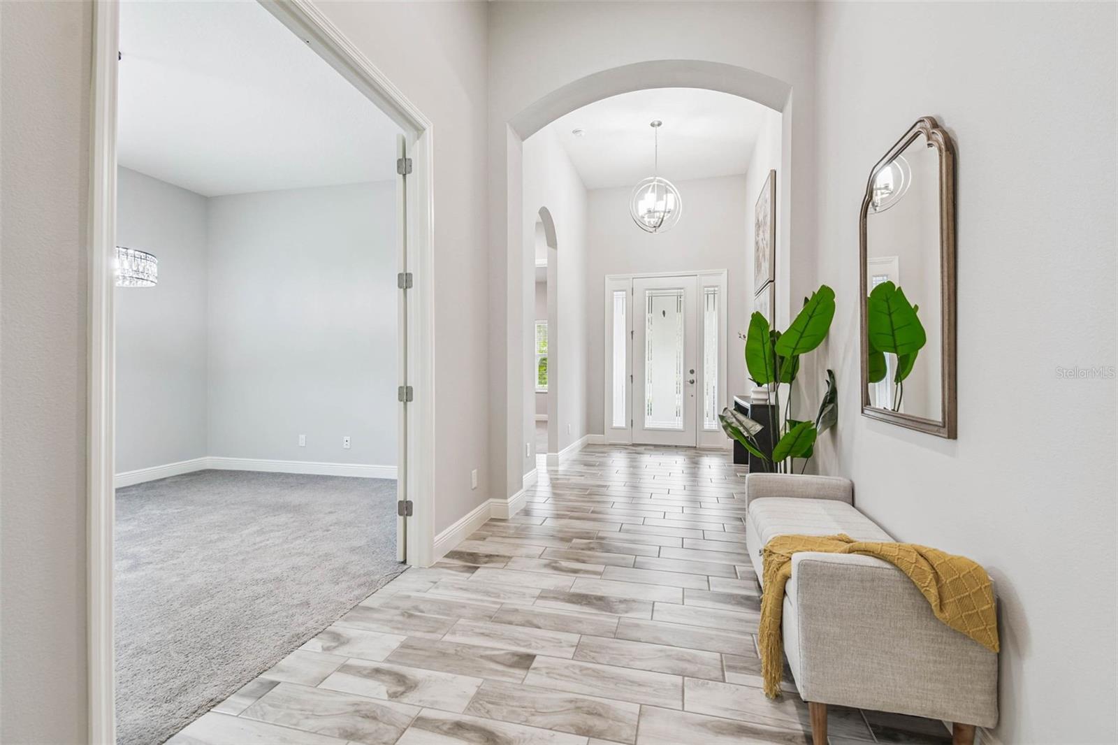 Beautiful way to welcome visitors with 11 ft tall ceilings in the grand foyer
