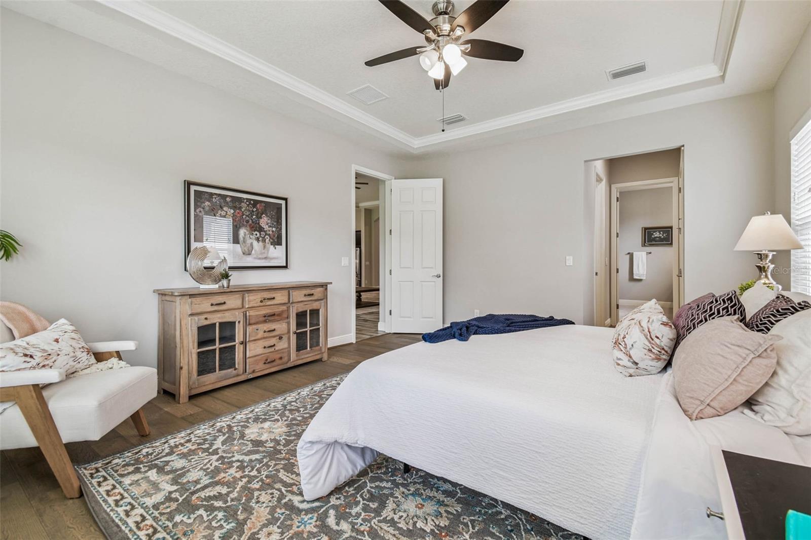 Tray ceiling and luxury vinyl flooring