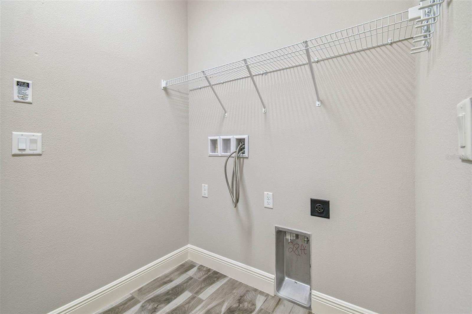 Laundry room off of the garage