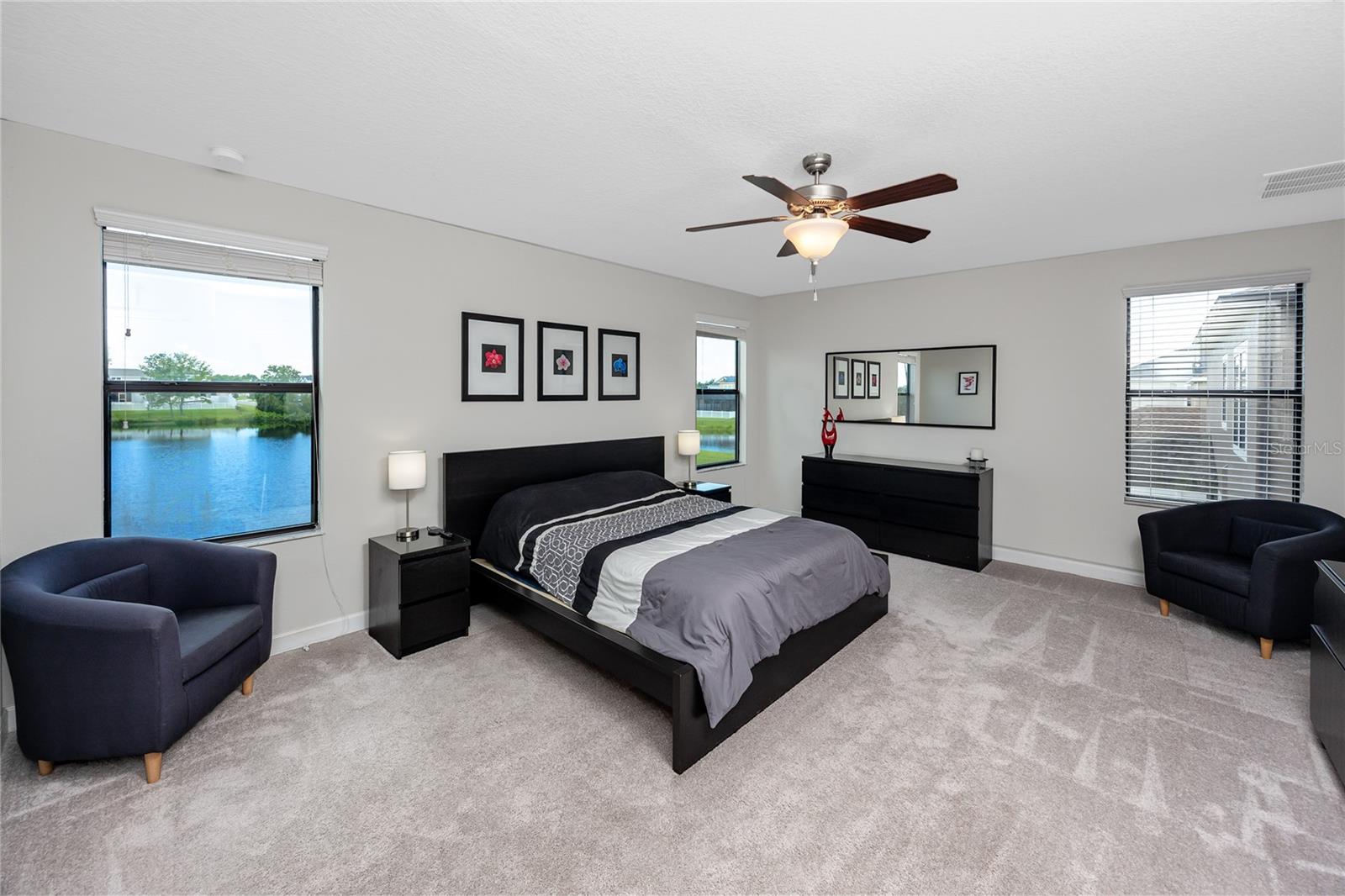 Upstairs Primary Bedroom with lake views