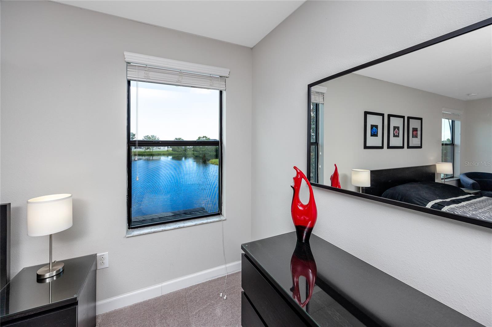 Upstairs Primary Bedroom with lake views