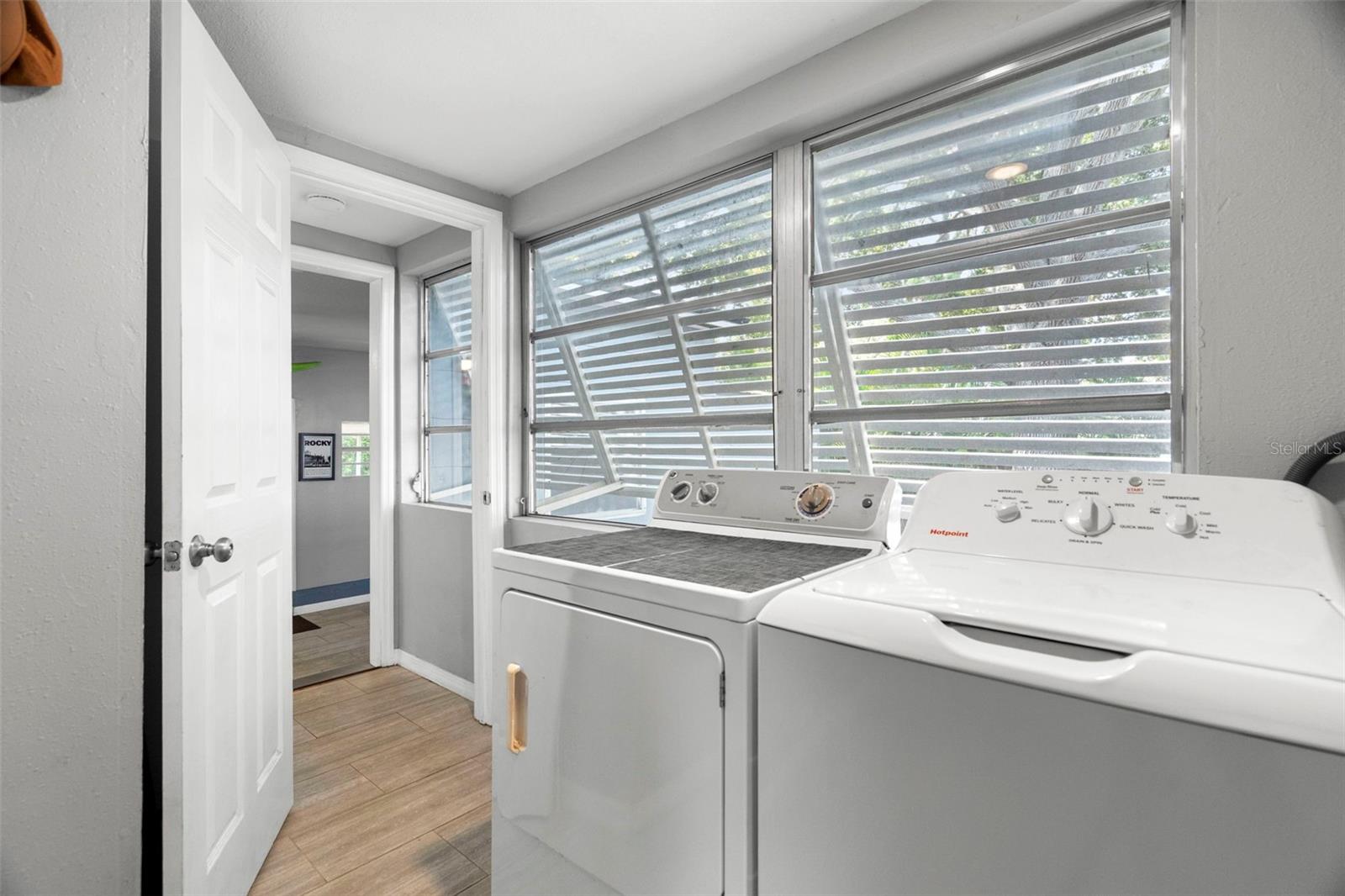 The breezeway, utility room, and second full bath - offers incredible flexibility.