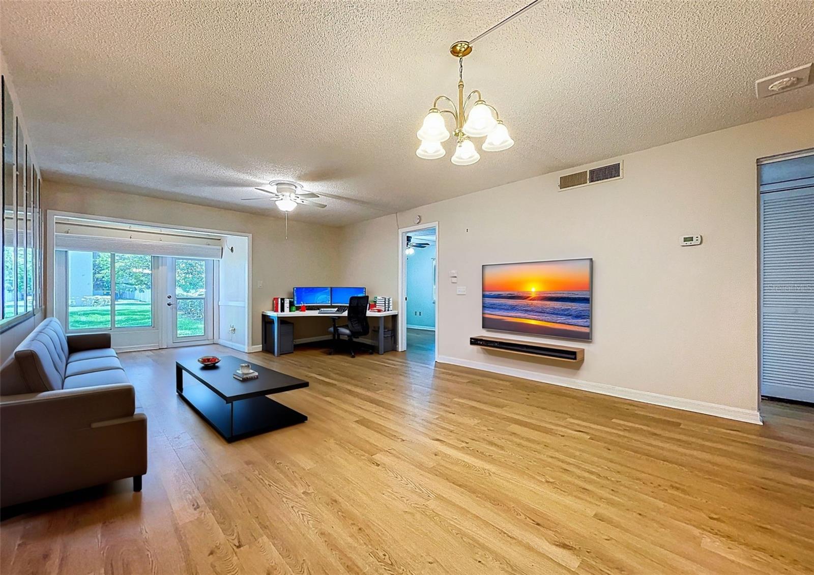 Natural light pours in through new windows and doors (2021)
