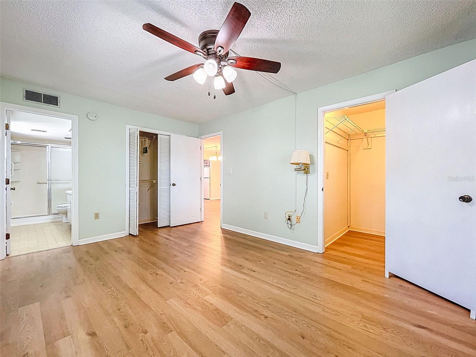 Primary Bedroom has a walk-in closet and wall closet.