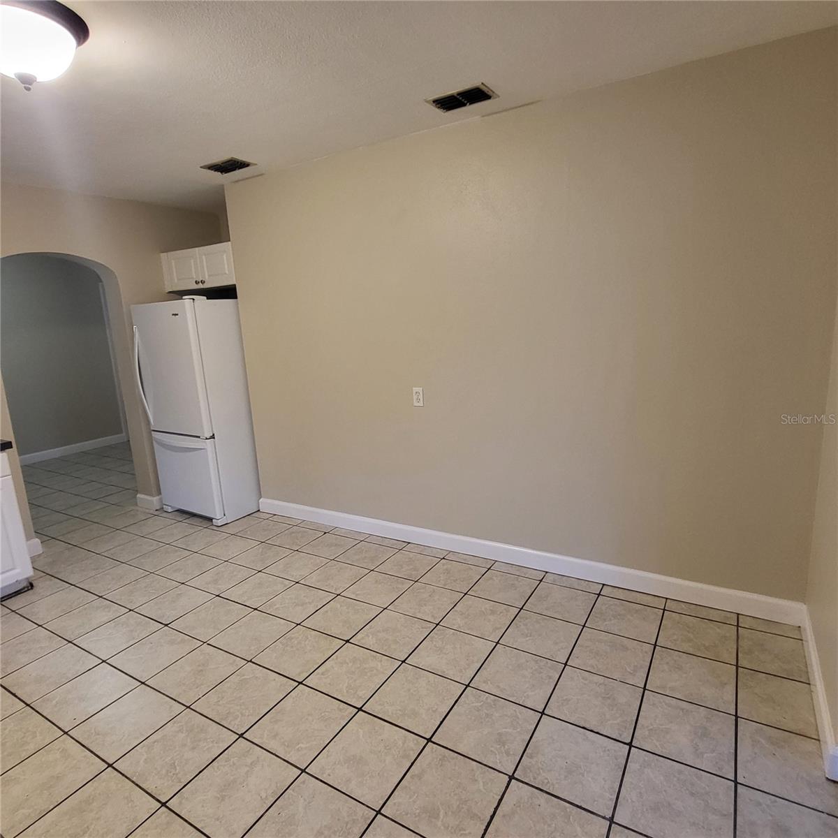 Extra space in kitchen provides room for a table, coffee bar or pub cabinet!
