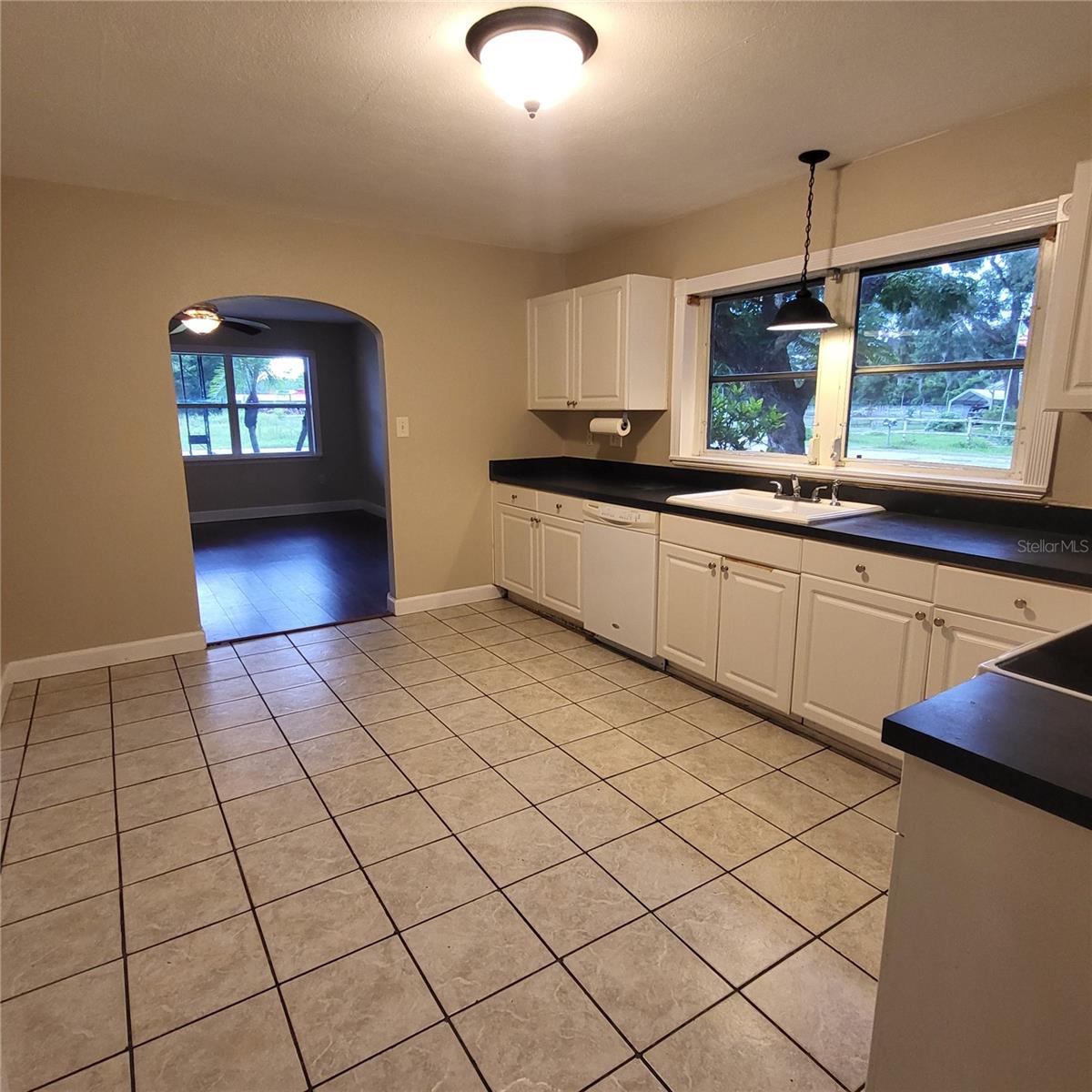 Spacious, open kitchen offers ample cabinets & counter space