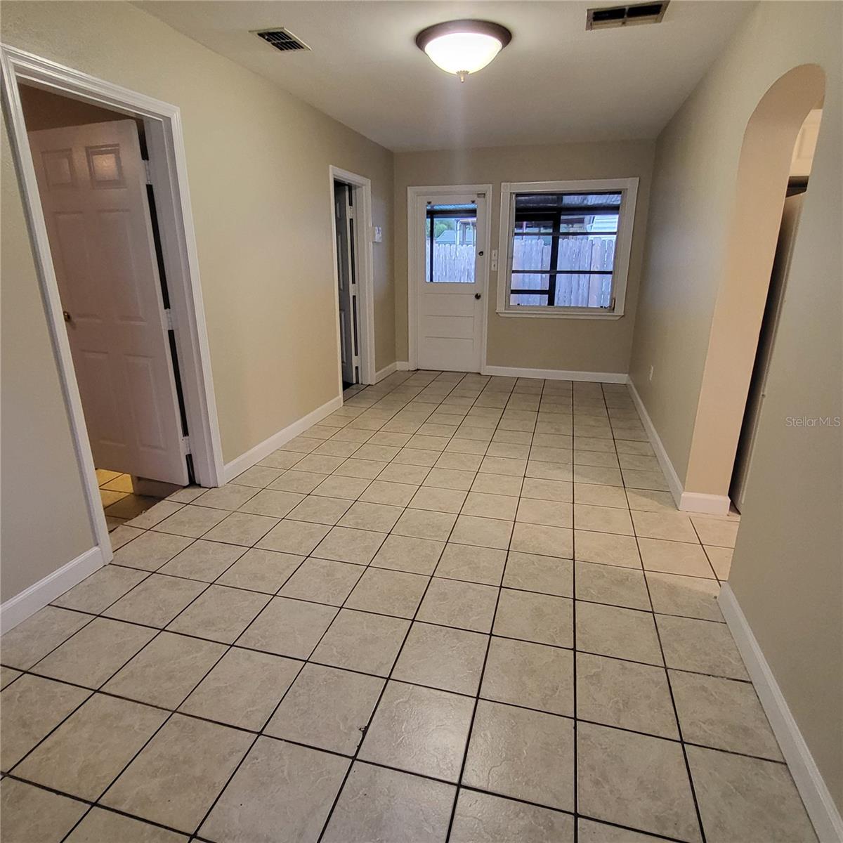 Bonus Room with door to back patio could be used as an office, den, formal dining ... the choice is yours!