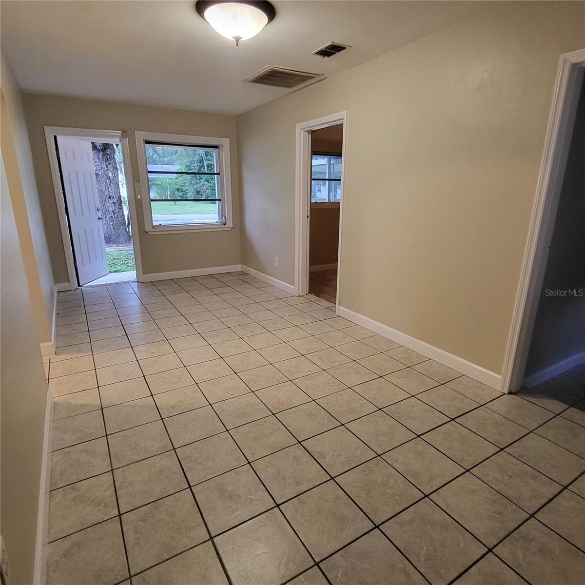 Bonus Room has an exterior door to carport area and is situated between the kitchen, utility room & two more bedrooms.