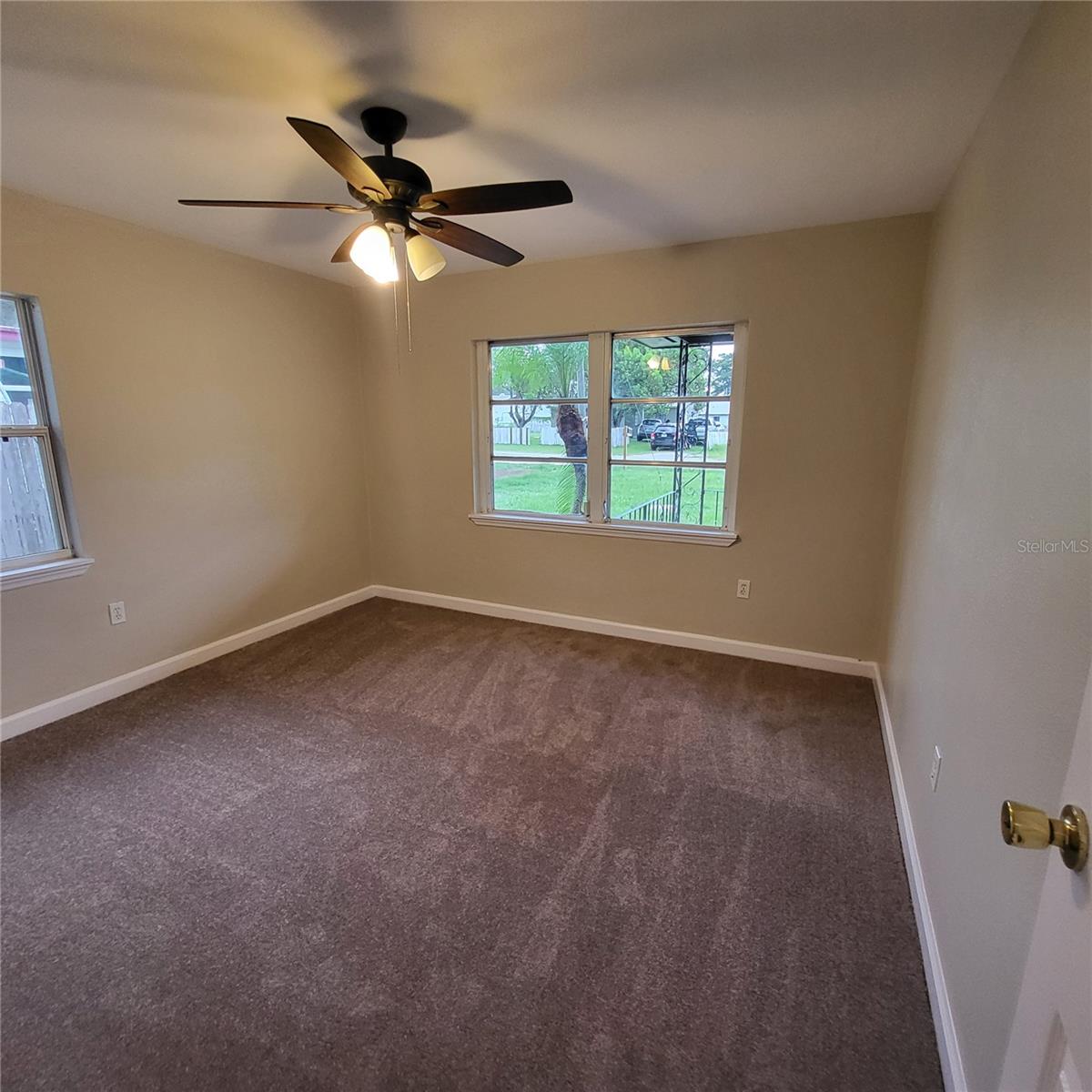 Front bedroom off living room.  Brand new paint, carpet and freshly cleaned windows!