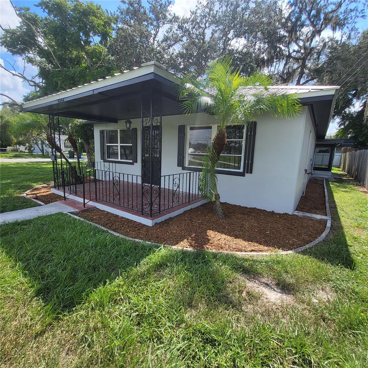 View of front & side of house