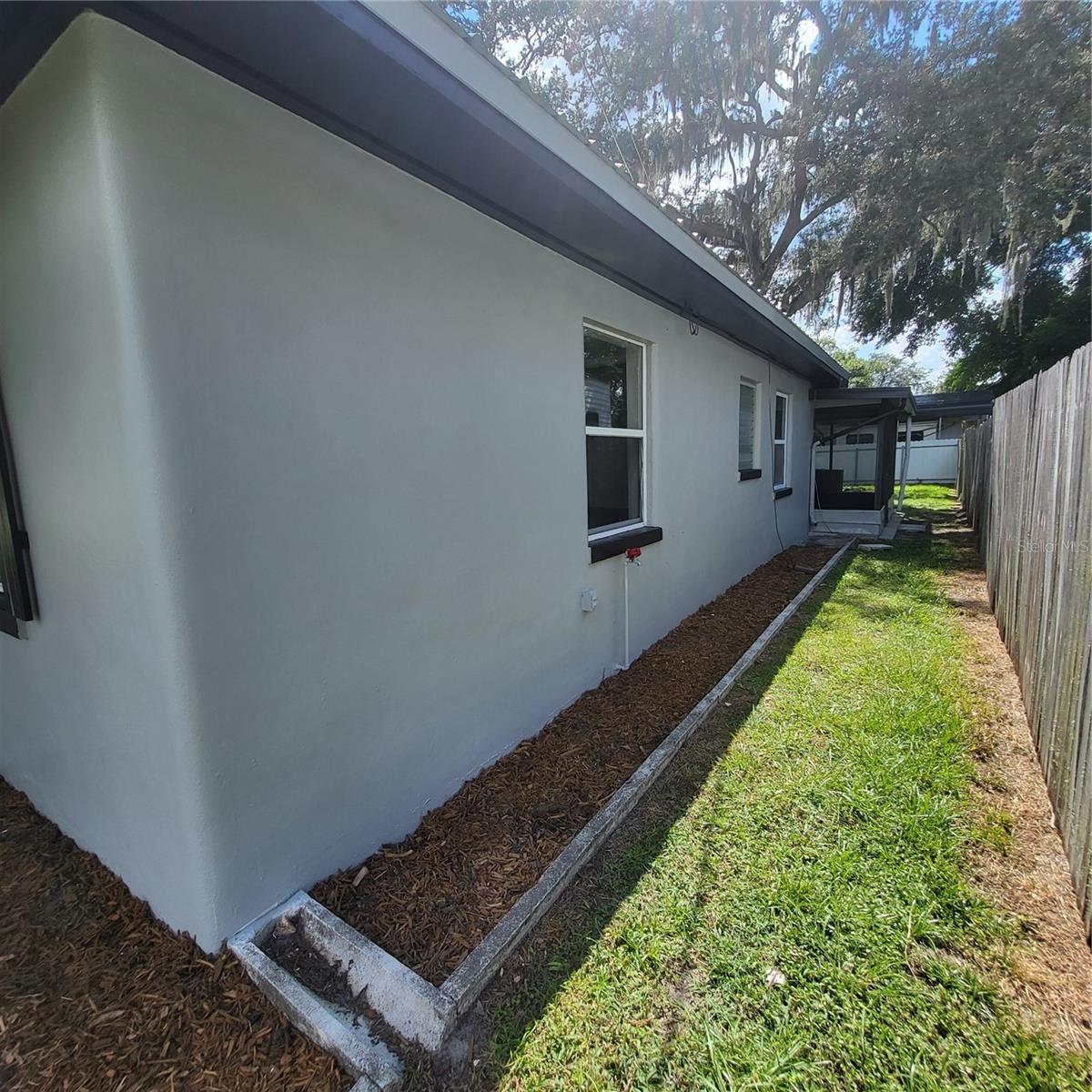 Right side of house from front to back