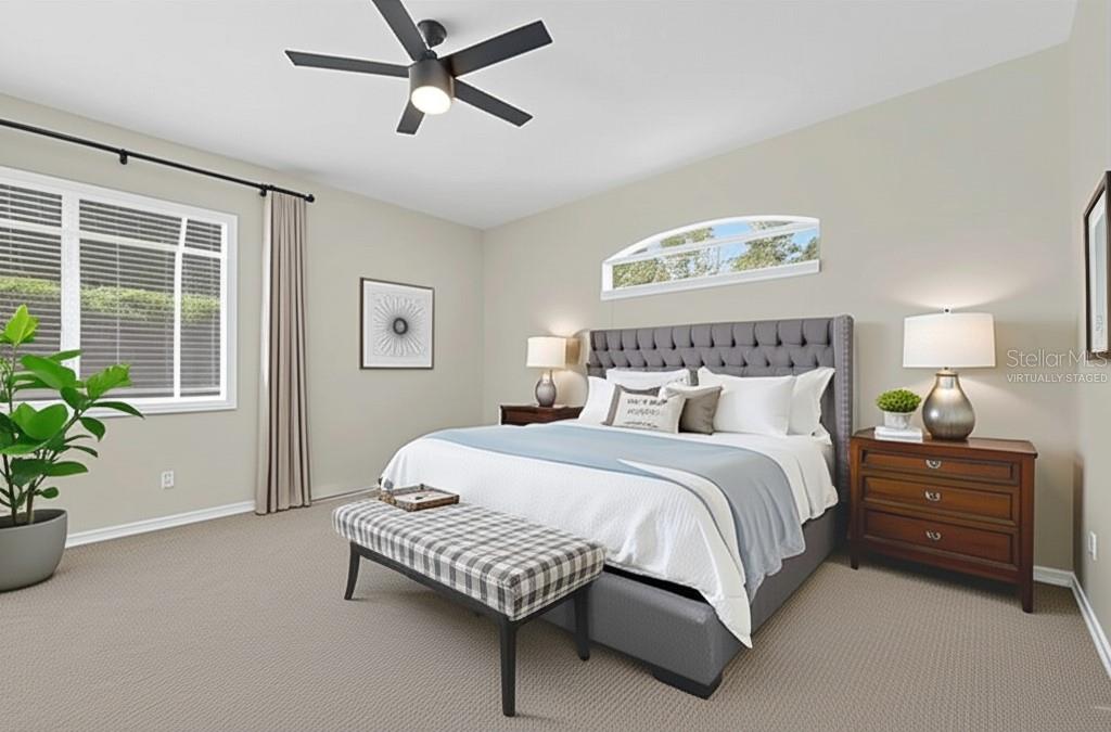 Virtually staged Primary Suite on 1st floor.