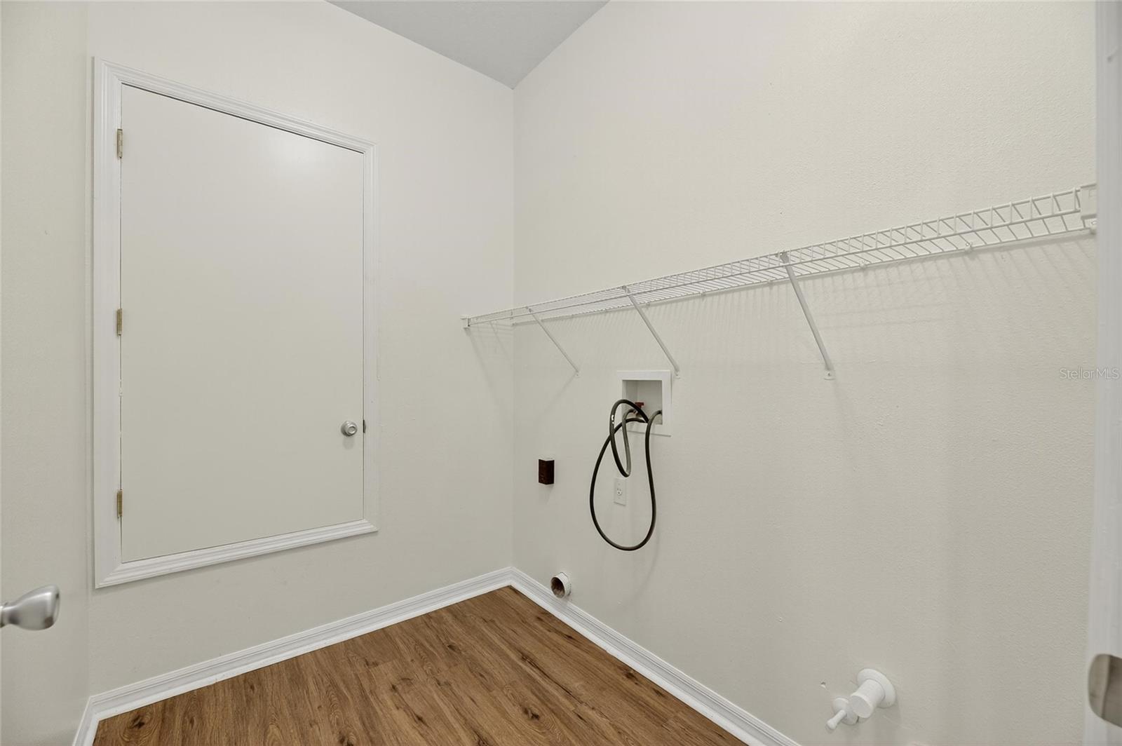 Storage closet under stairs