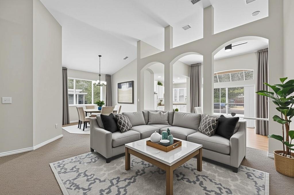 Virtually staged Living & Dining areas.