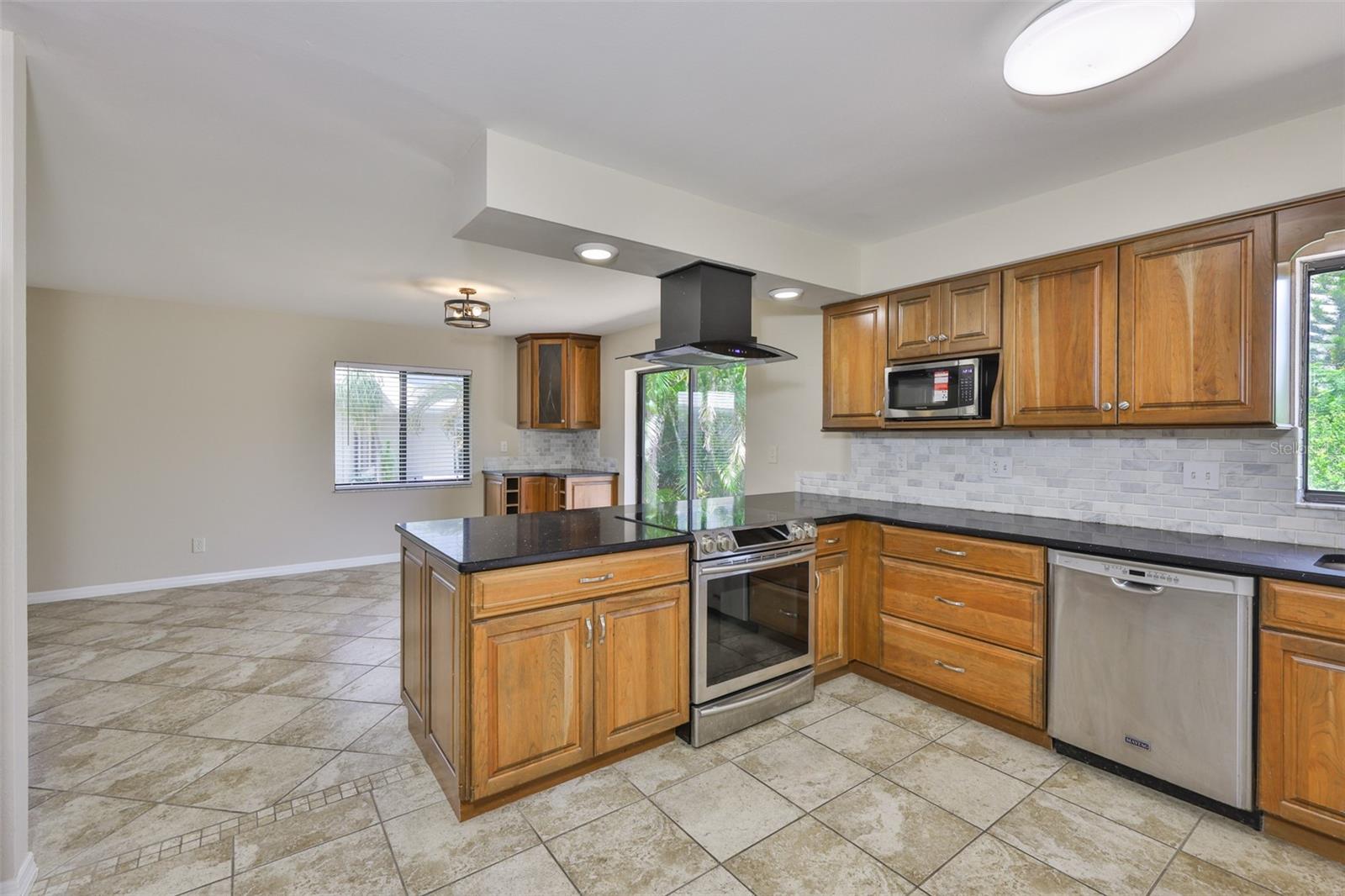 Kitchen is open to the family room area, so that you always feels a part of the action.
