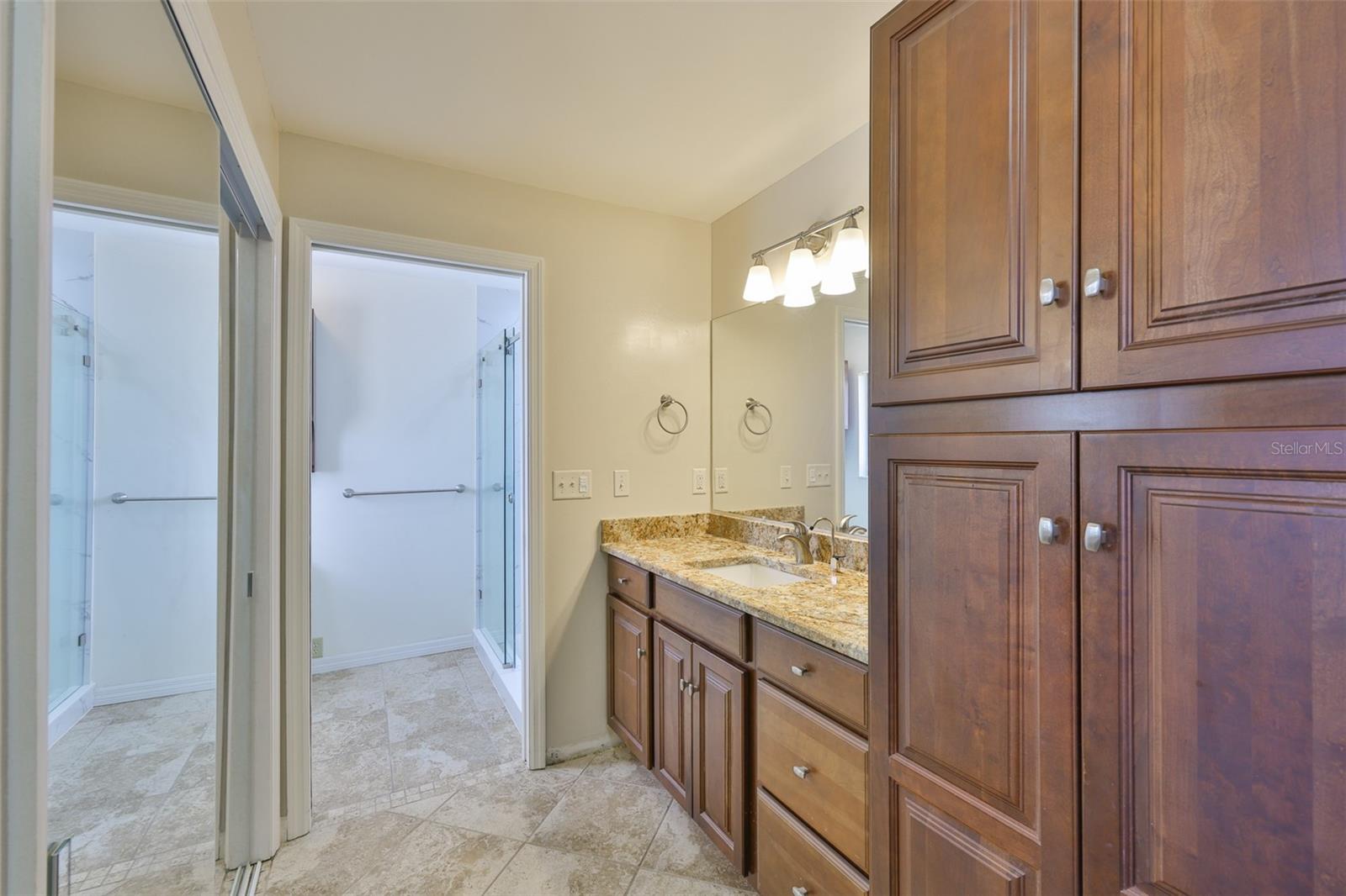 Notice the modern finishes, with extra storage. Including the master bathroom with matching cabinets.