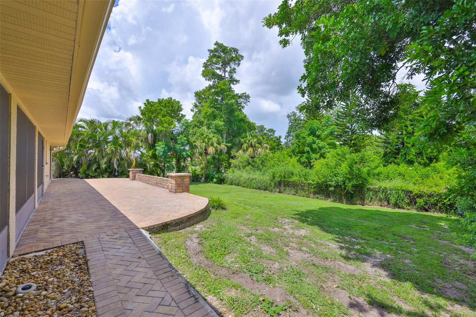 Enjoy the benefits of nature without sacrificing convenience - this hidden gem is just minutes away from local amenities, yet feels a world away. If you are searching for a private sanctuary, this is it! While there is a fence, your lot actually goes back another 100 feet.