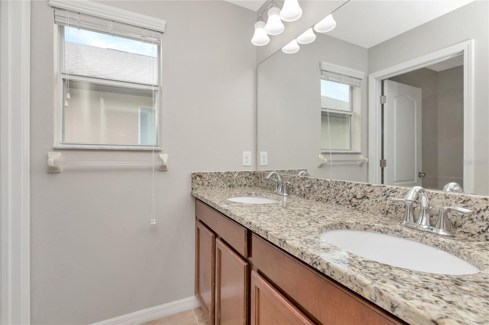 Upstairs Full Bathroom with dual sinks